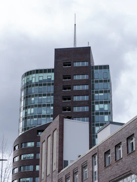 Modern office buildings against a cloudy sky