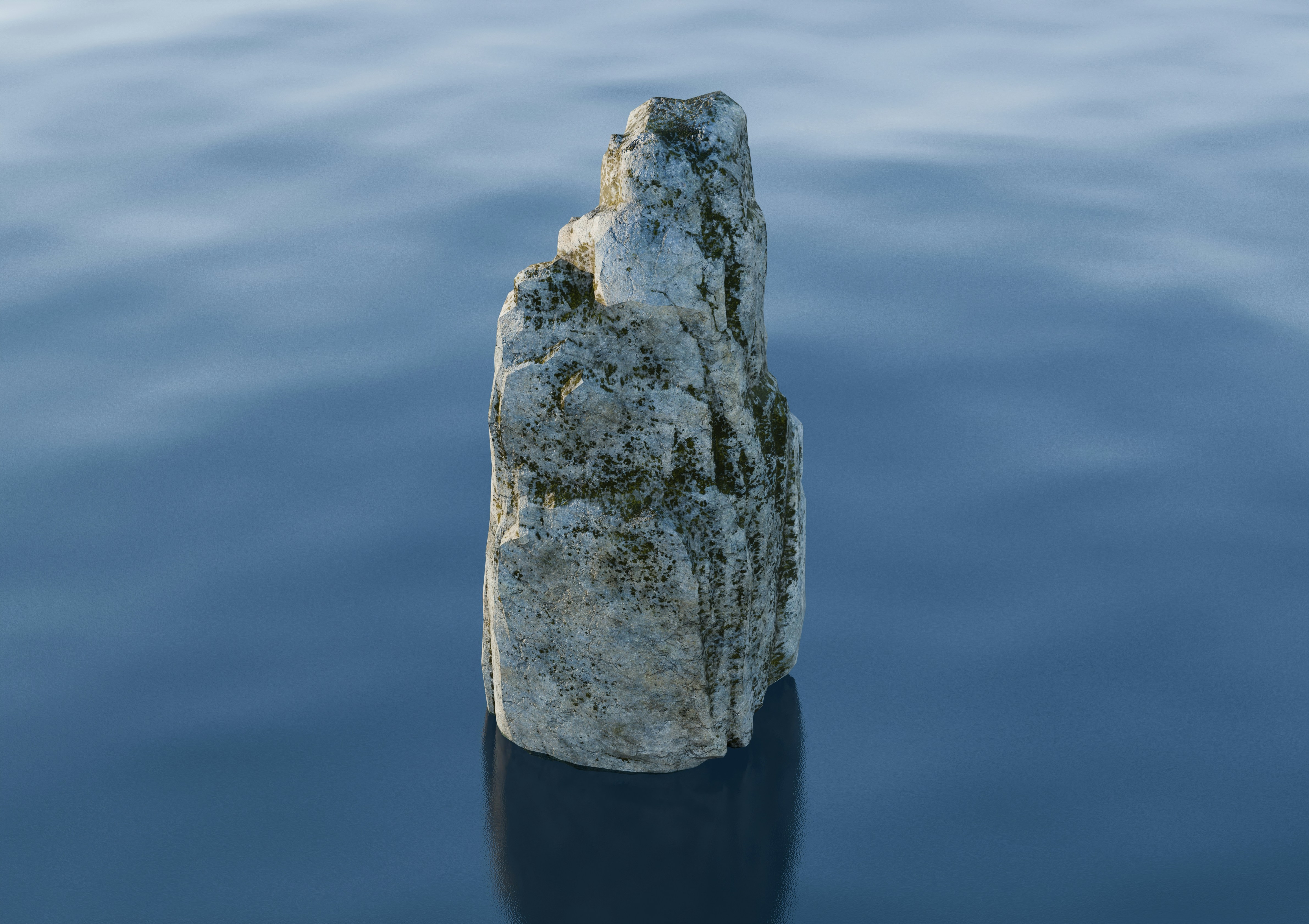 A single rock stands tall in the water.