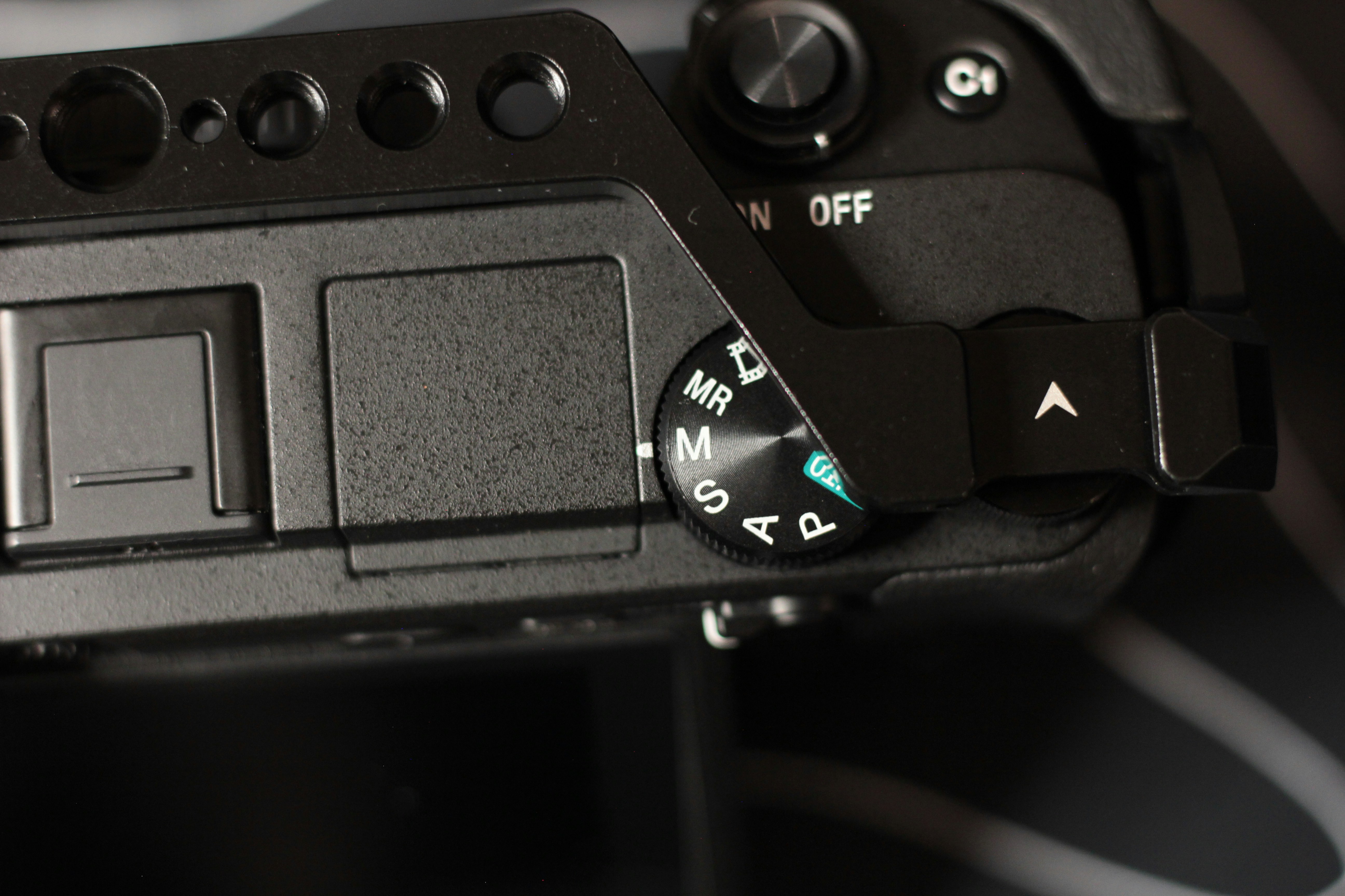 Primer plano del dial de modo de una cámara