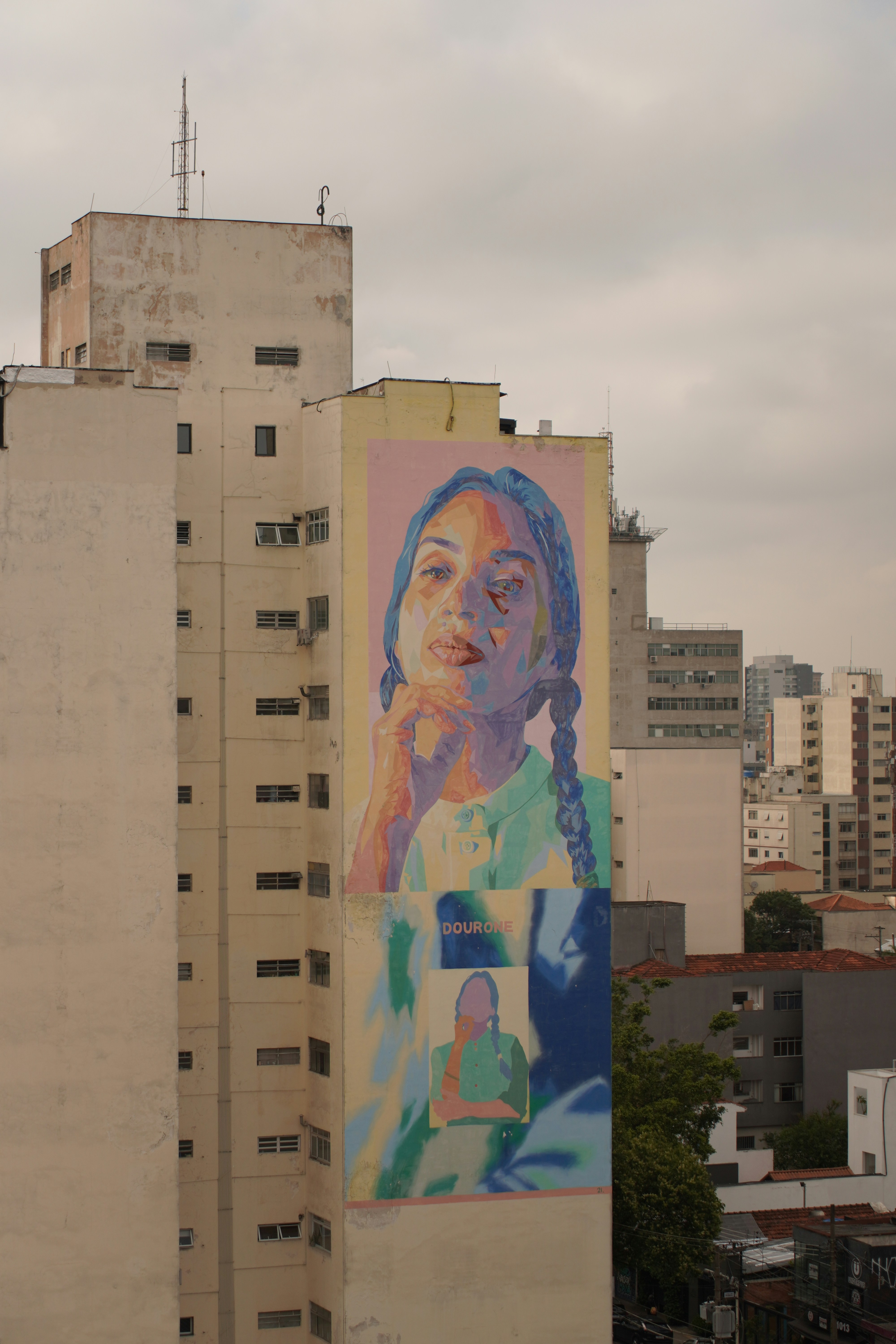 Mural of a woman's face on a building
