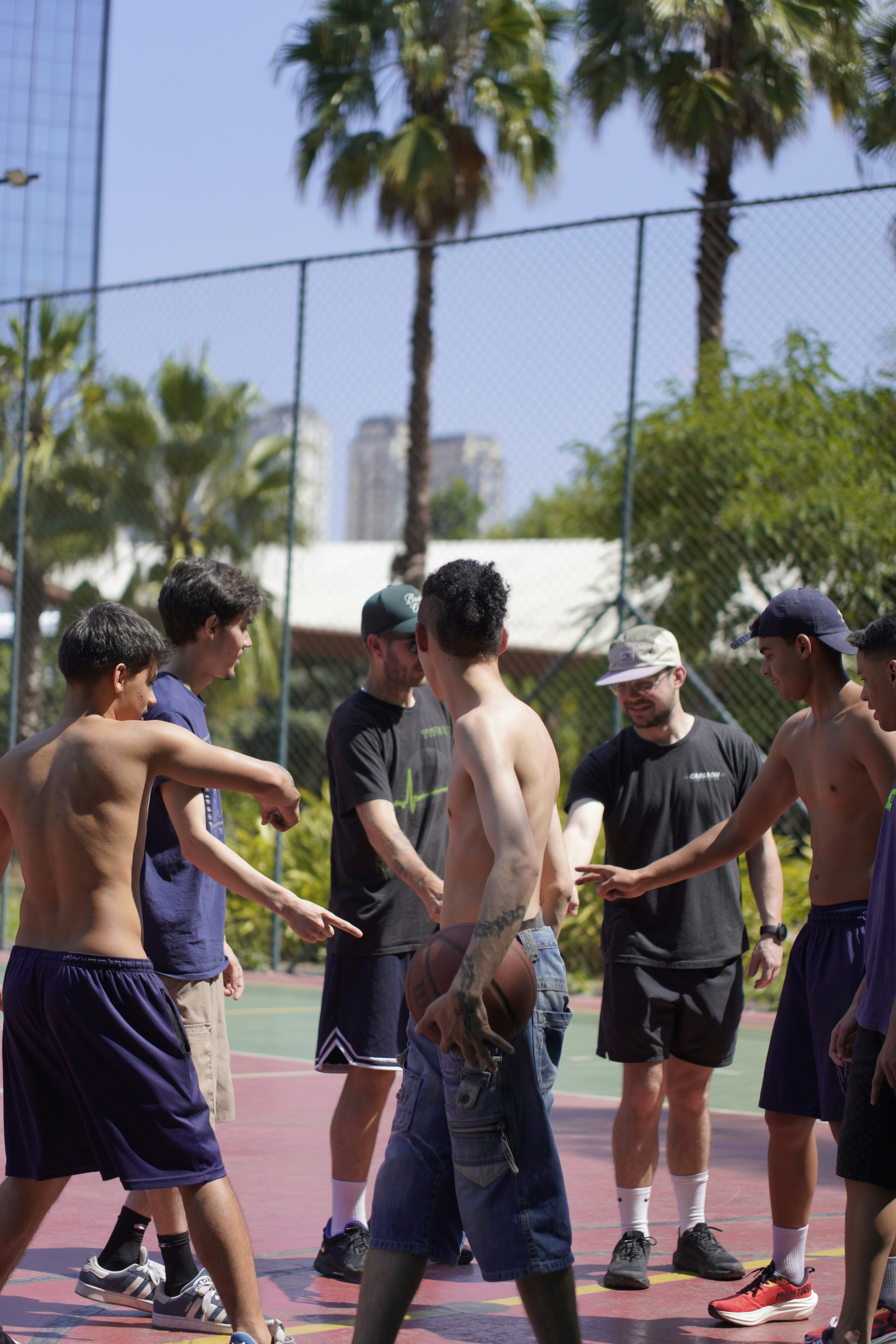 Group of young men on basketball court