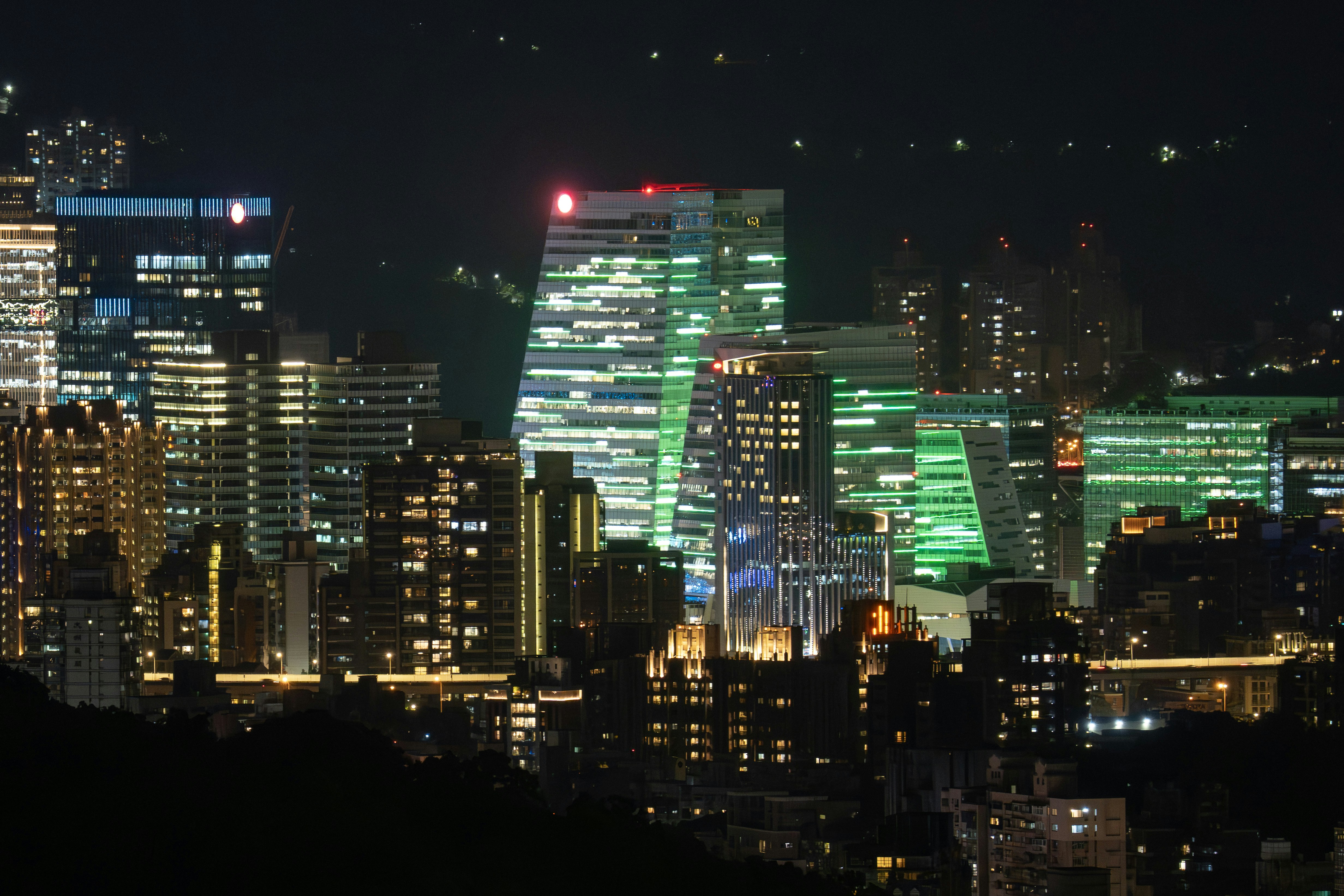 Illuminated skyscrapers in a city at night