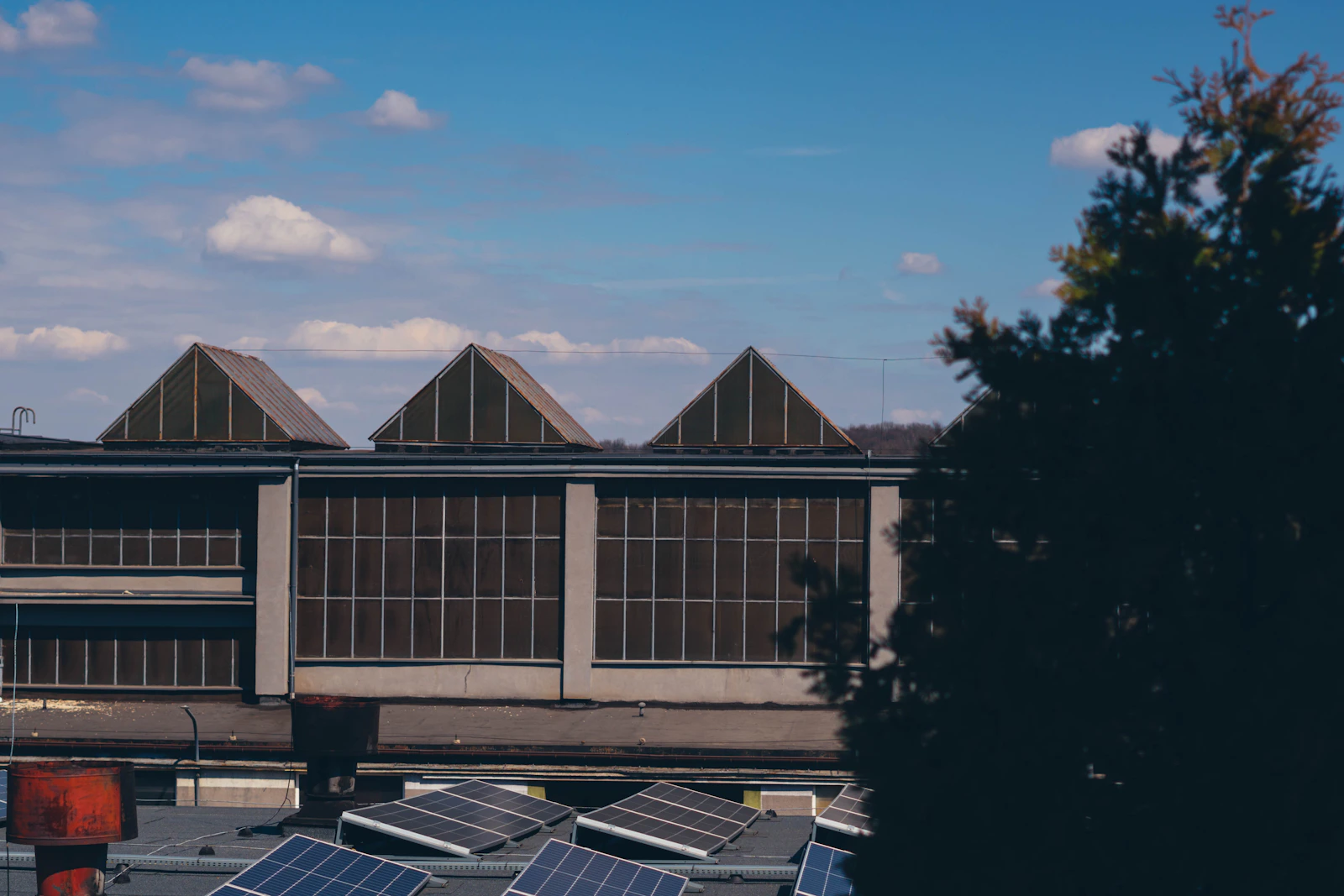 Industrial building with rooftop solar panels — Iliatoras