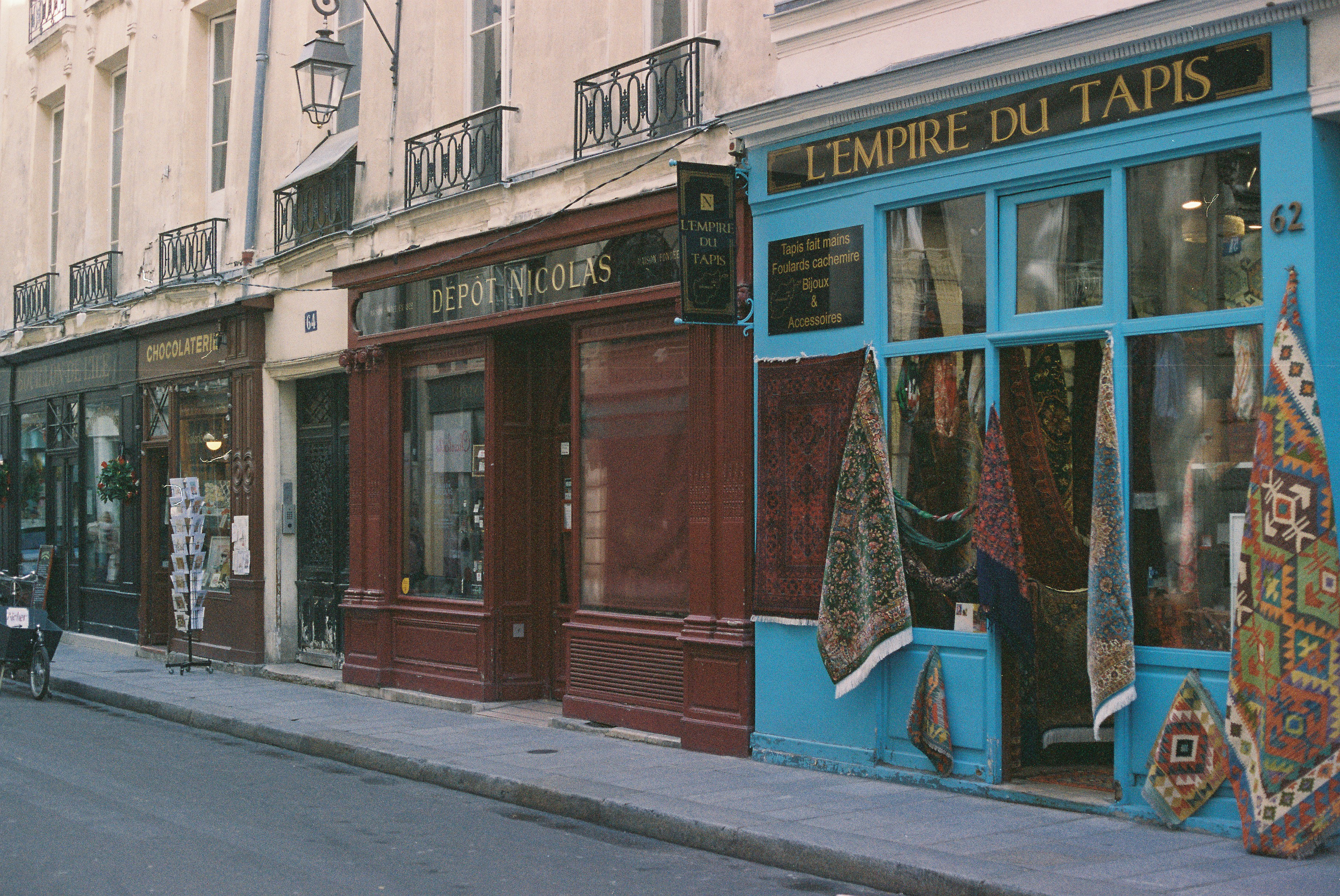 Shops with colorful displays on a european street.