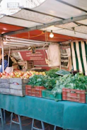 Fresh produce displayed at an outdoor market stall.
