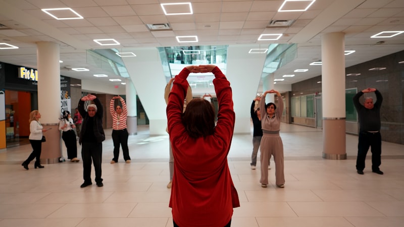 Senior fitness class participants exercising together
