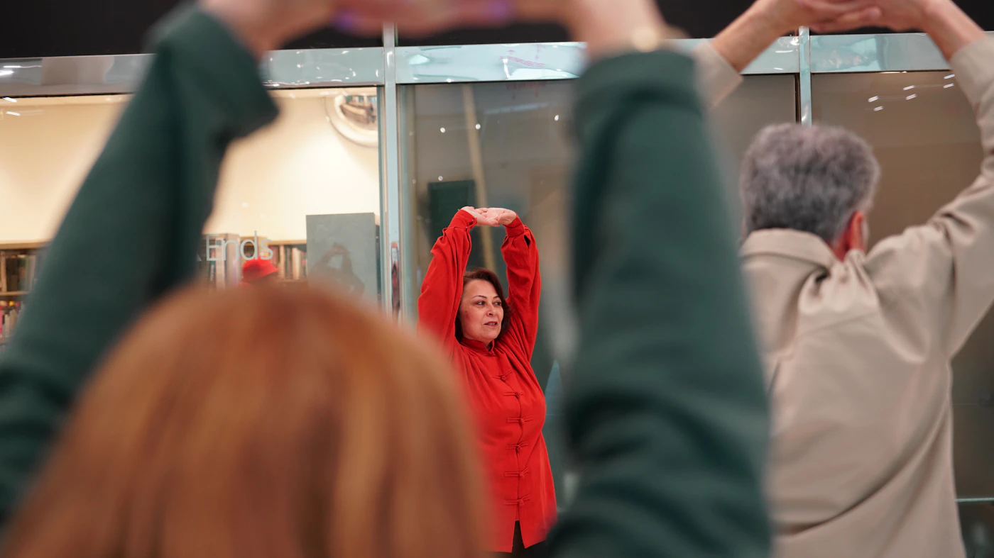People practicing yoga and mindfulness in a studio