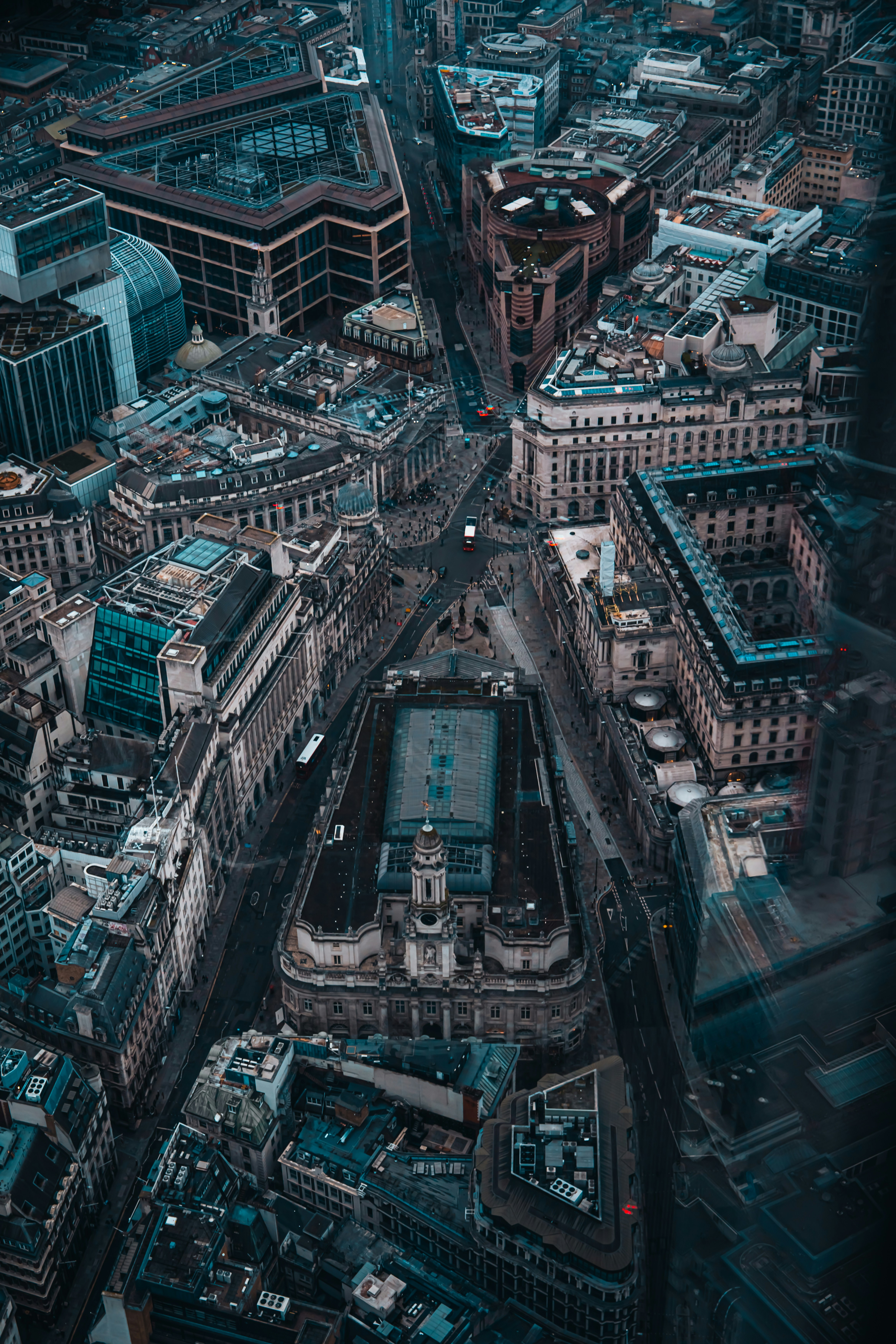 Aerial view of a dense cityscape with historic buildings.