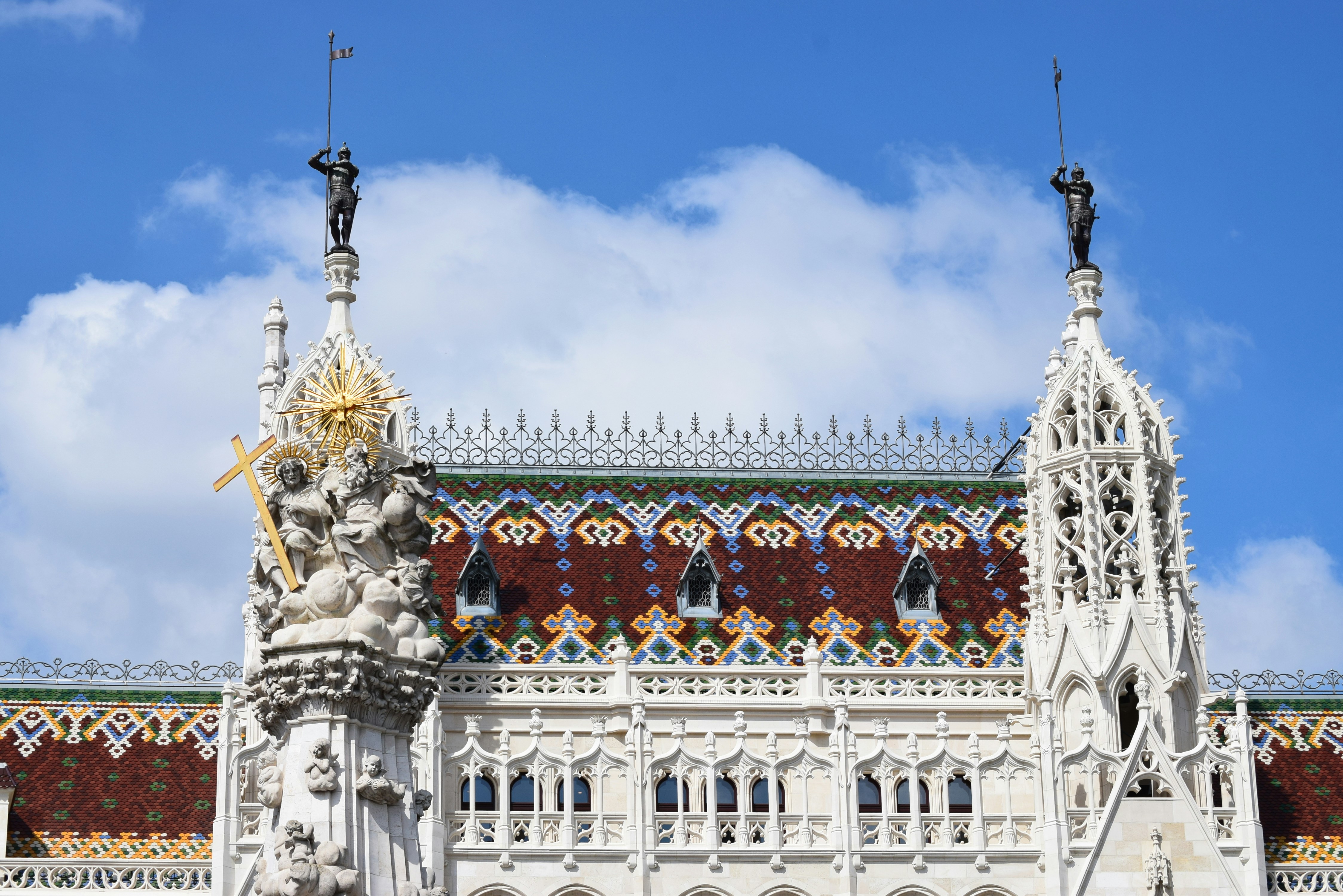 Ornate building facade with detailed architecture and statues