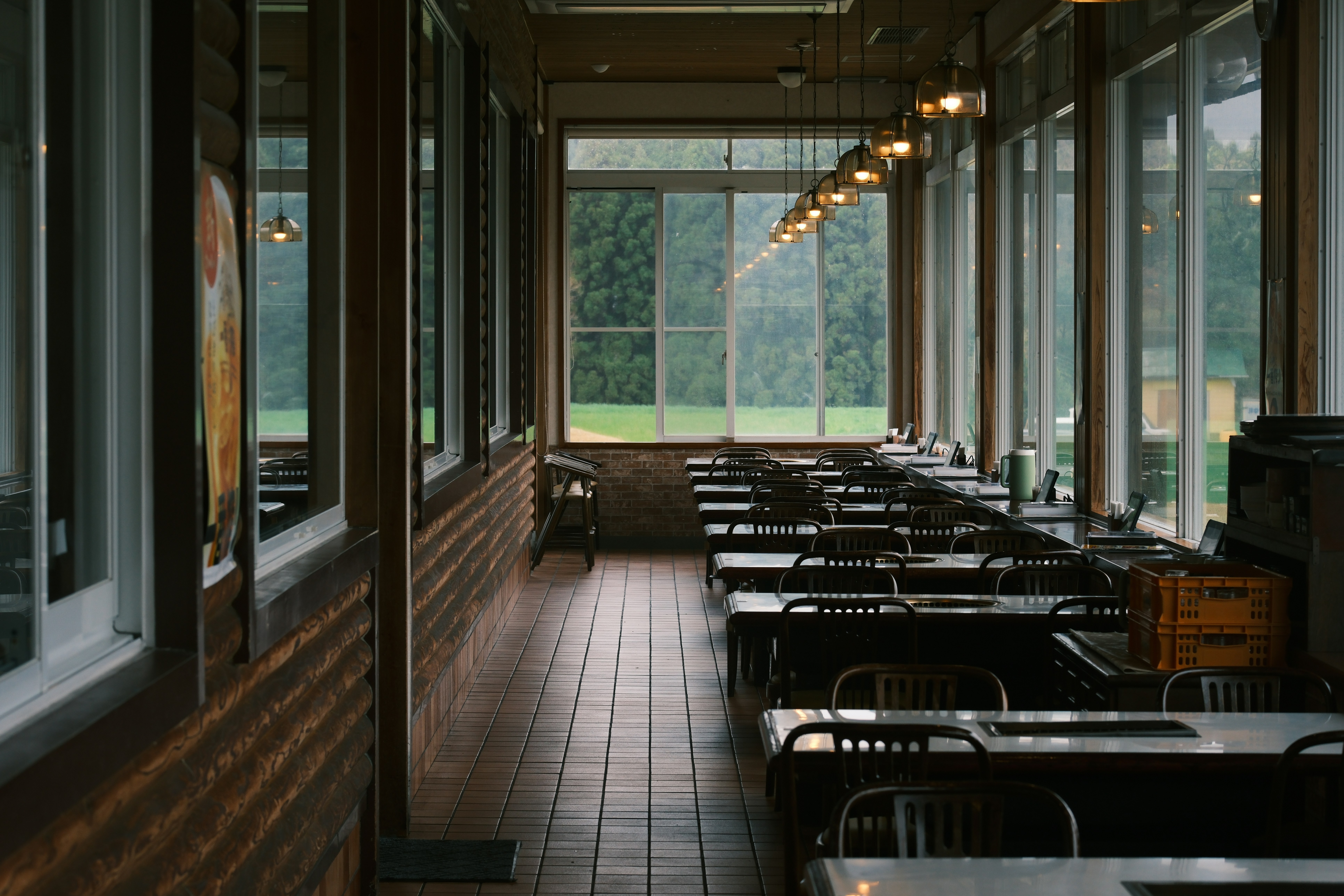 Empty dining hall with tables and chairs