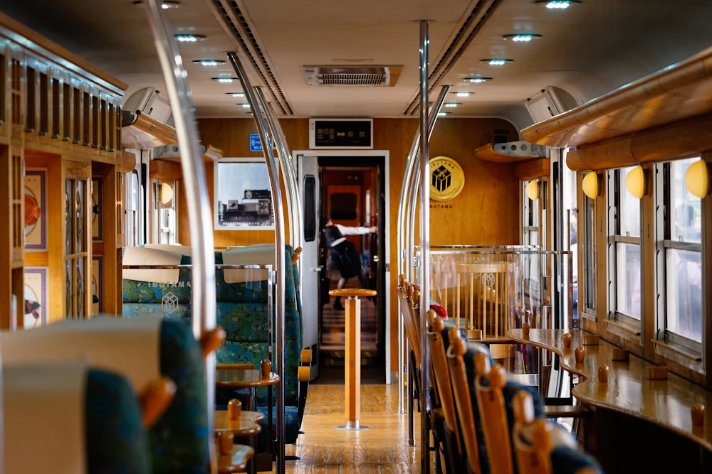 A warm wood-panelled converted carriage interior
