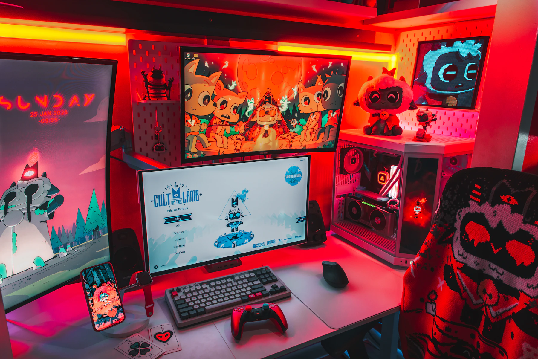 Multi-monitor gaming station with mechanical keyboard, gaming controller and illuminated gaming PC