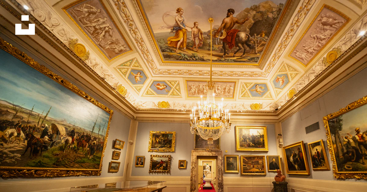 Elegant hall with paintings and a red carpet photo – Free Interior ...