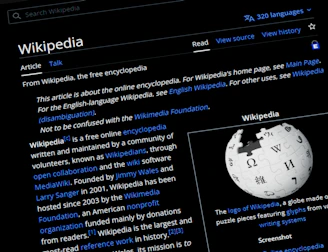 Wikipedia website displayed on a dark screen