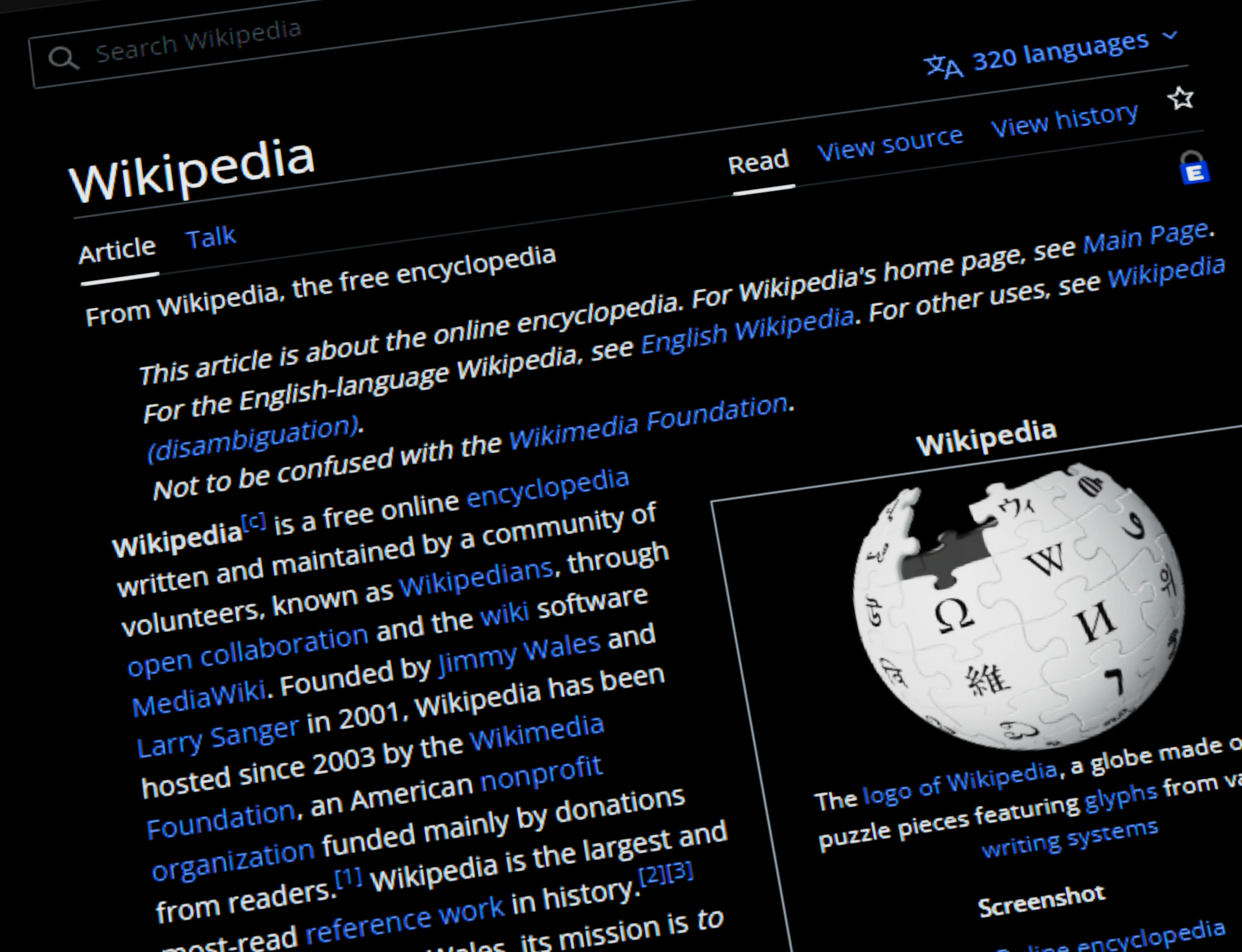 Wikipedia website displayed on a dark screen
