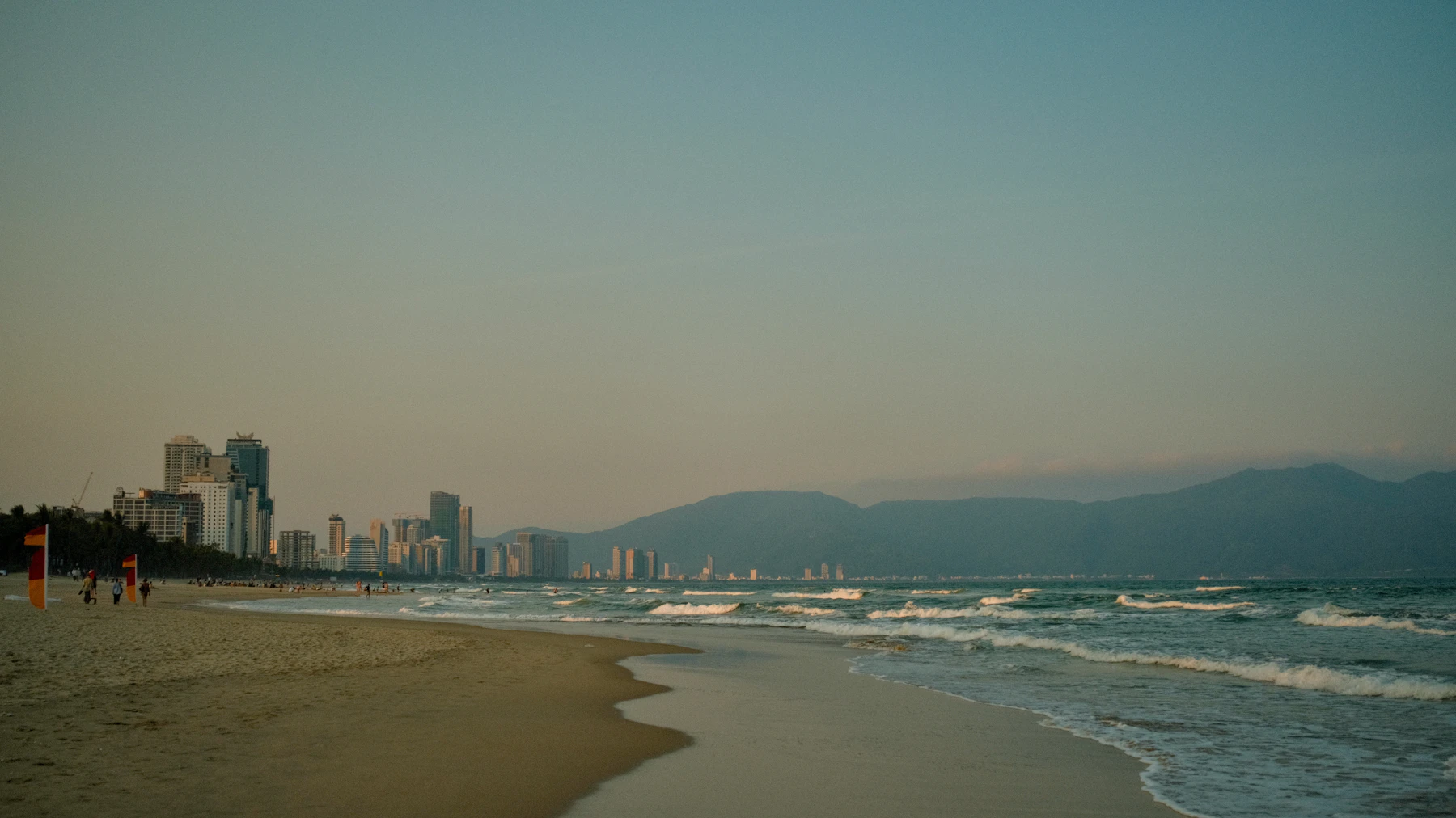 My Khe Beach with Da Nang city skyline and mountains in the background, Vietnam