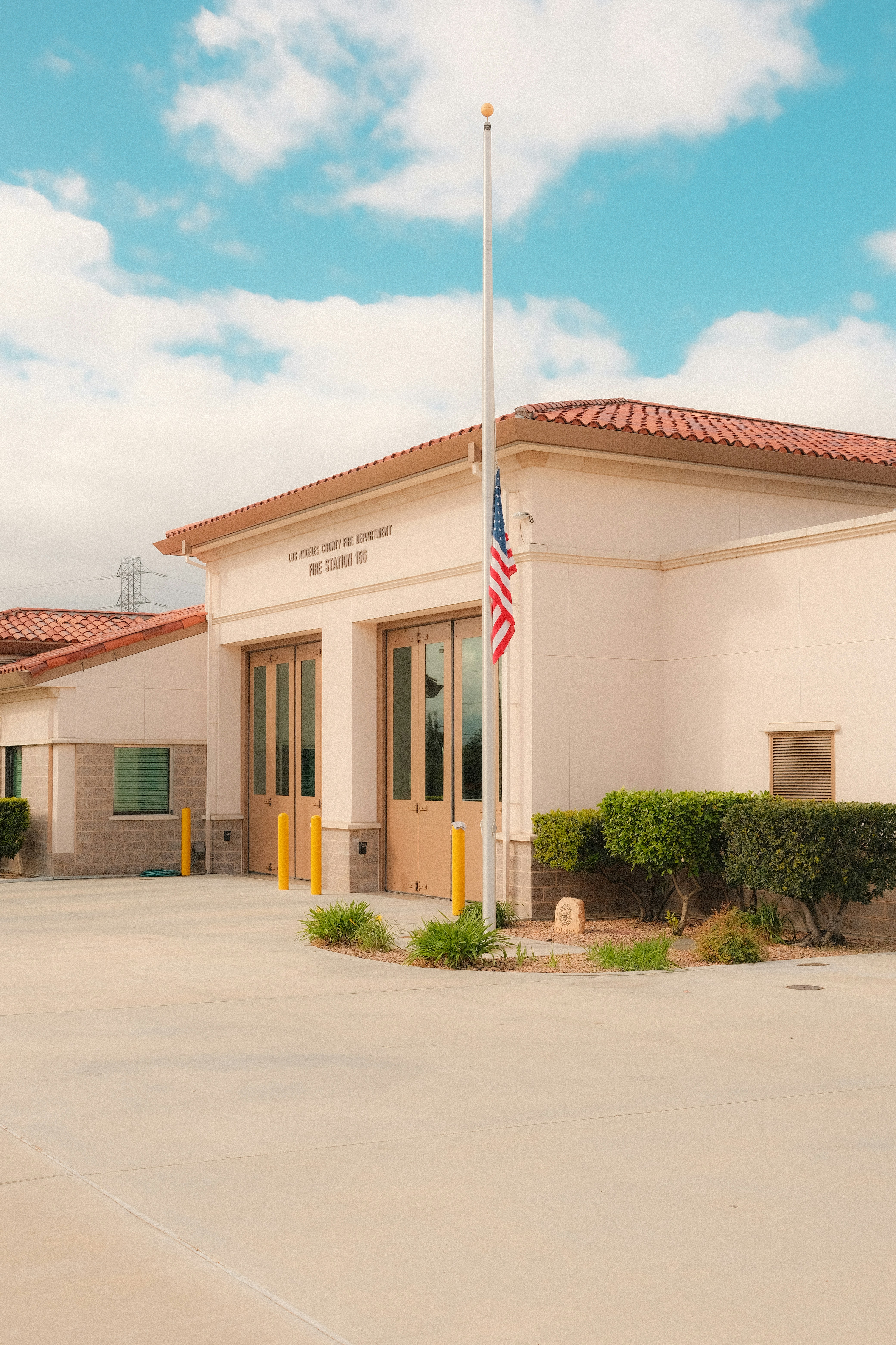 Fire station with american flag at half-mast