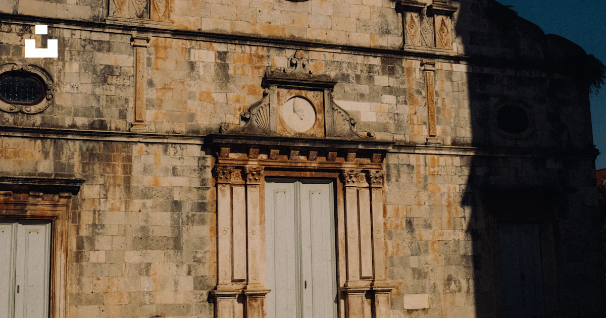 Sky Window Icon Stone church facade with arched windows and doors - Free Photo on Unsplash