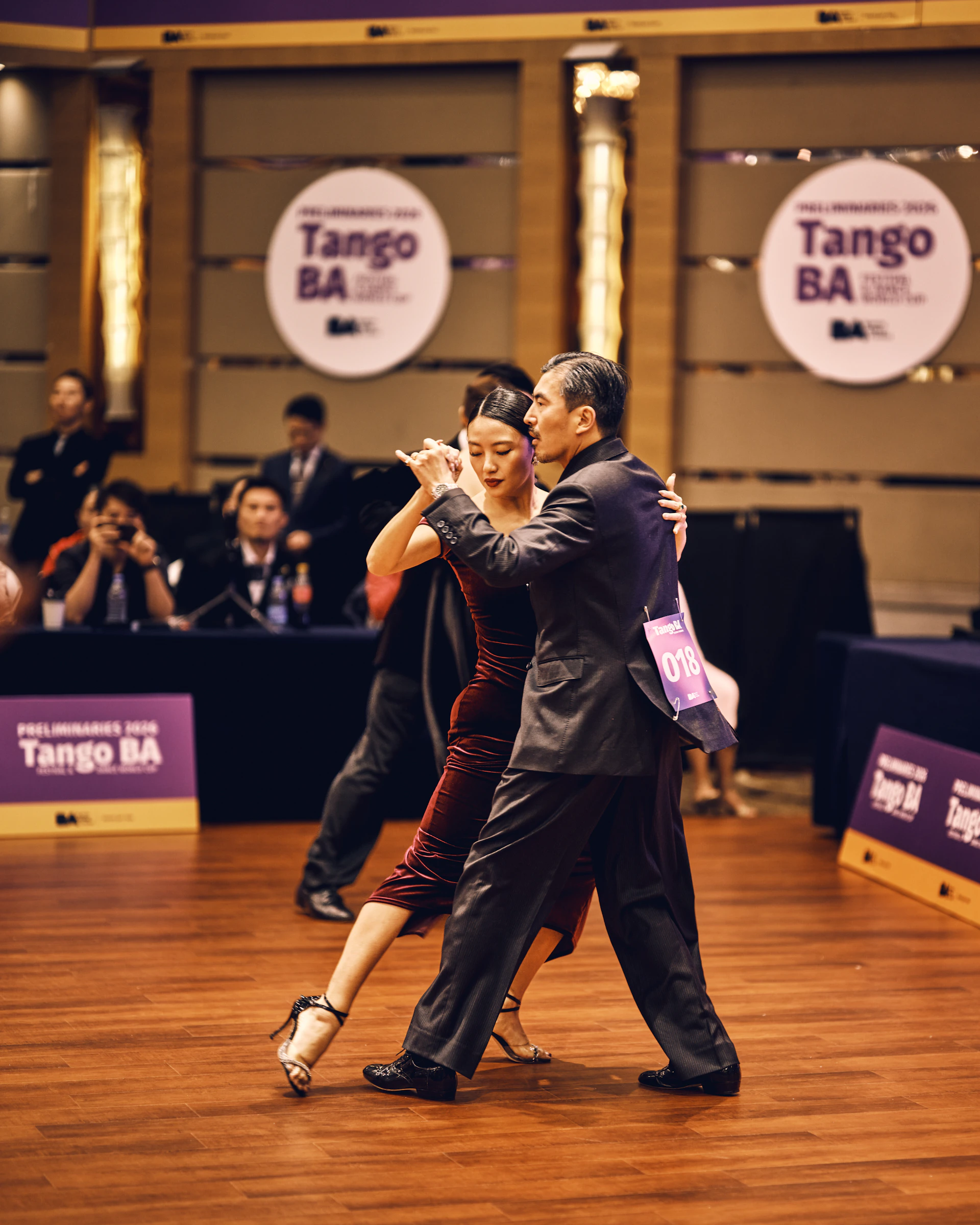 Couple dancing tango at a competition