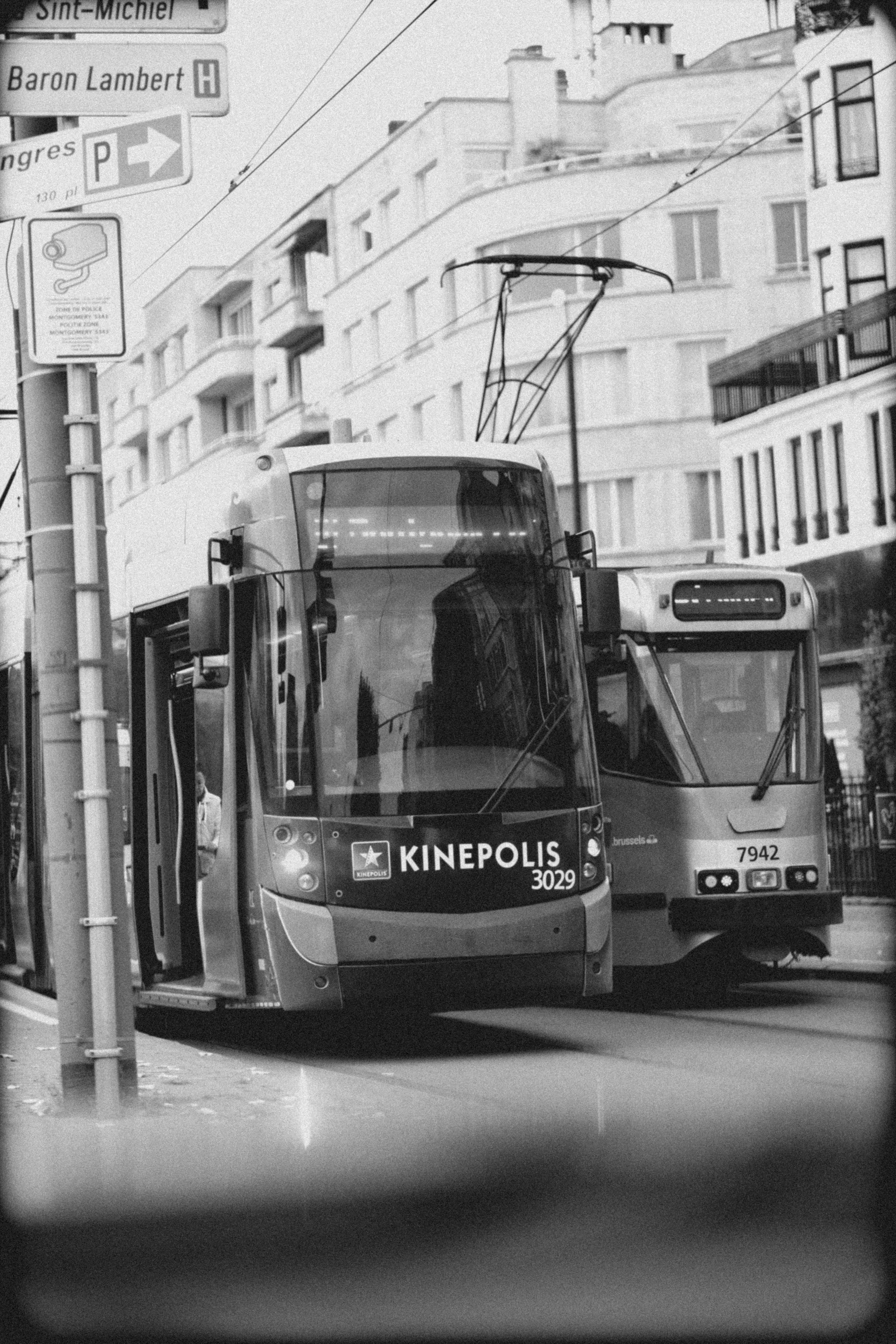 Two trams on a city street