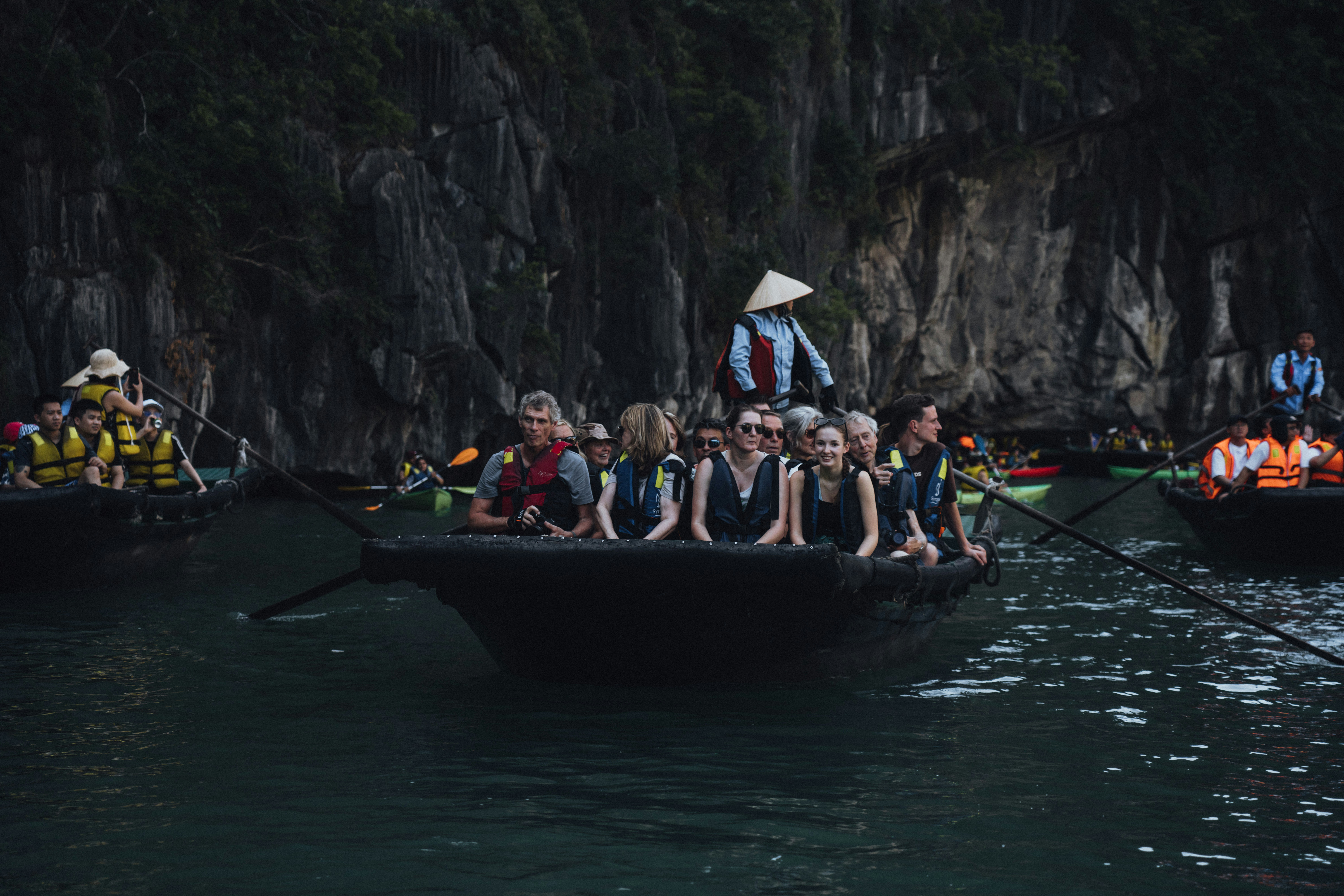 Travellers enjoying a cave boat tour