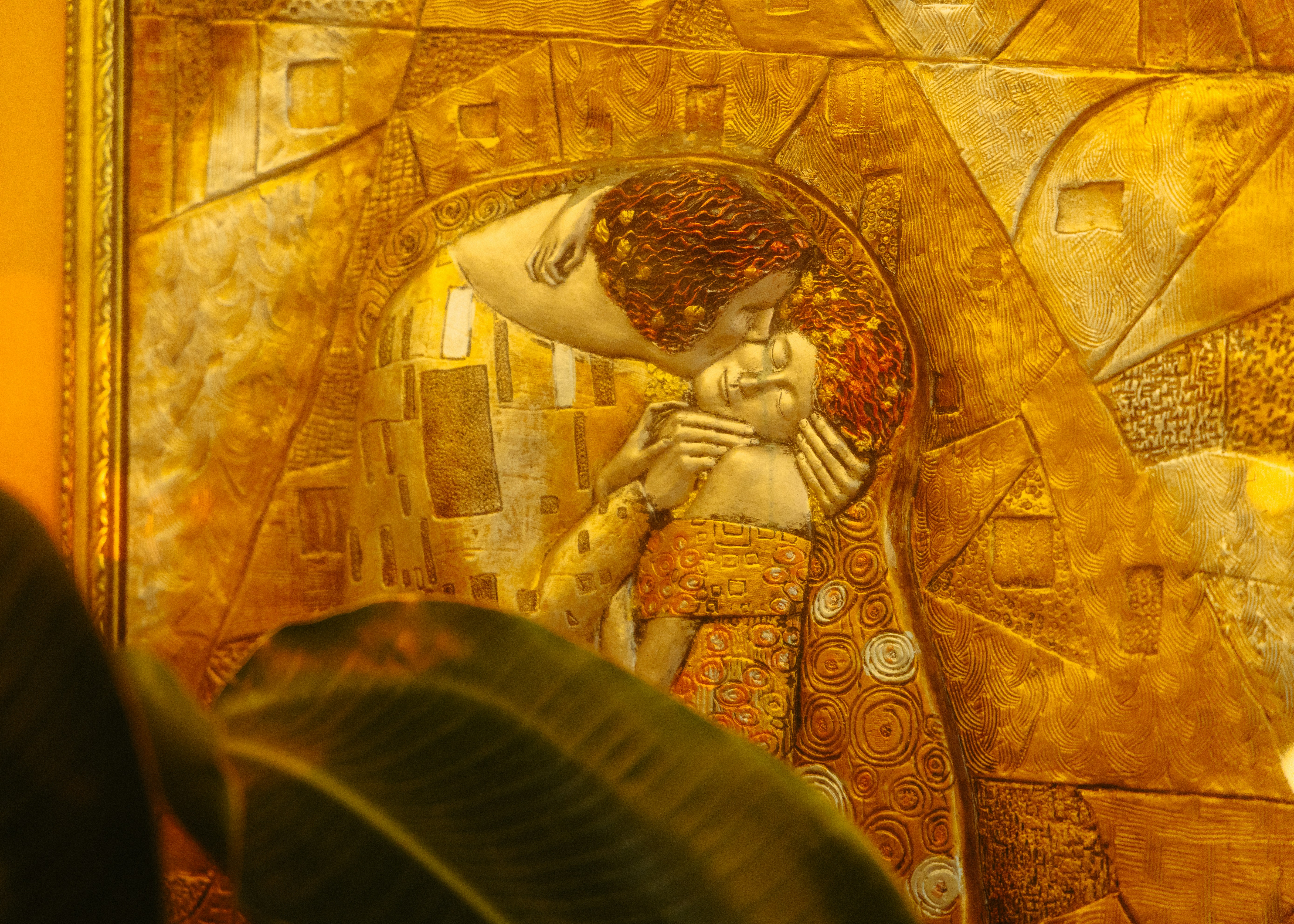 Abstract artwork depicting a couple embracing