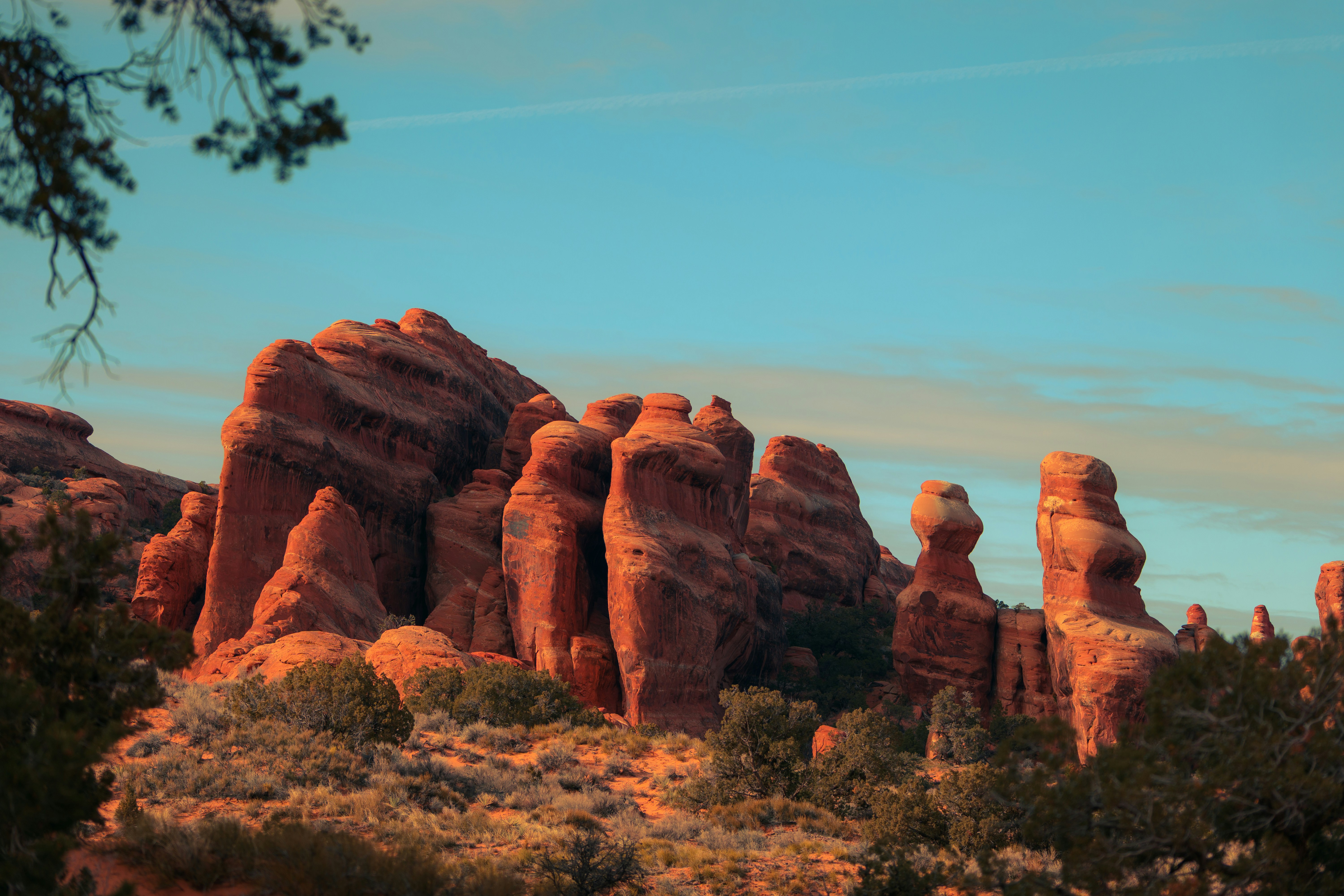 Red rock formations under a clear blue sky