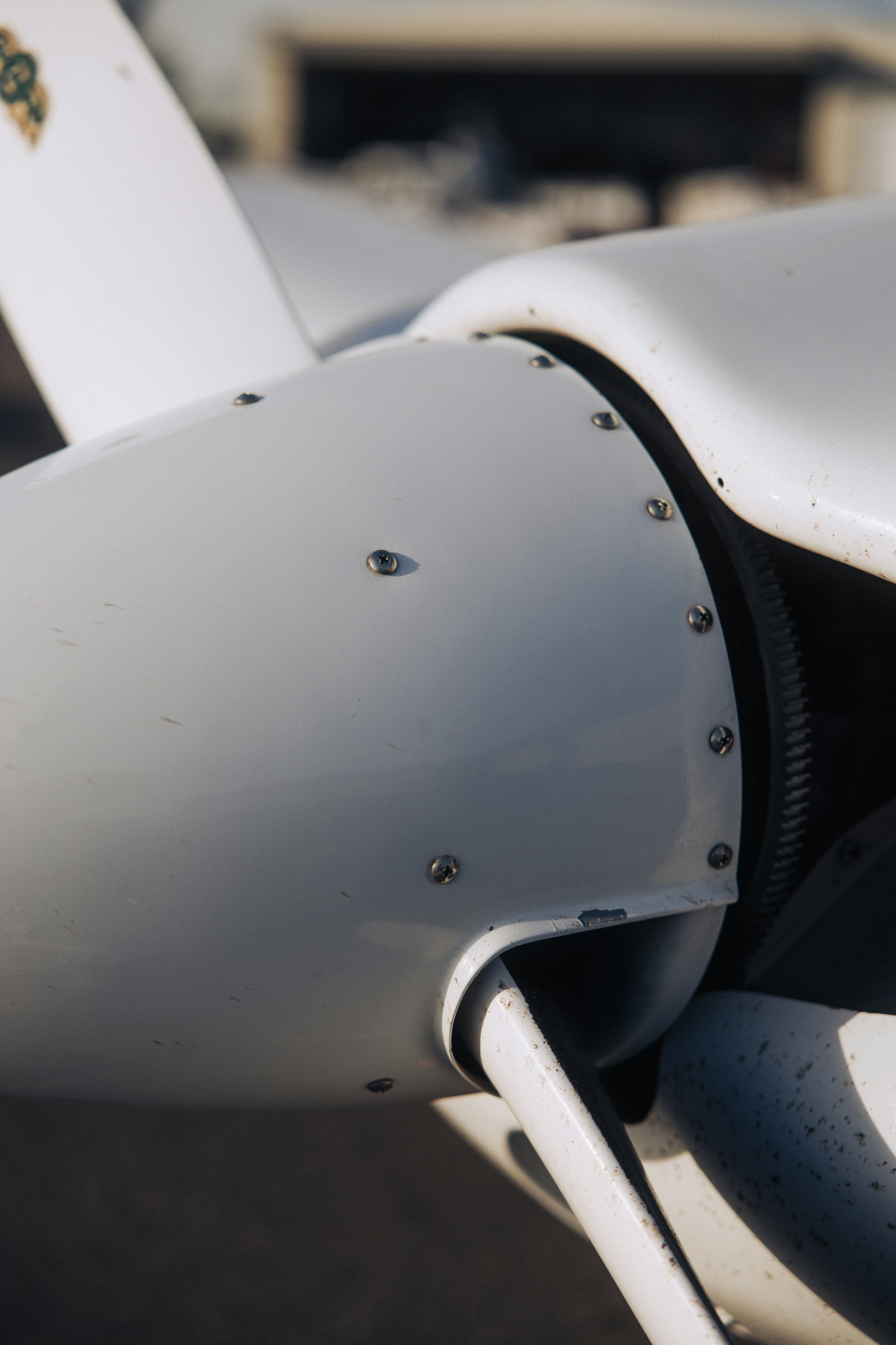 Close-up of a white airplane propeller and propeller.