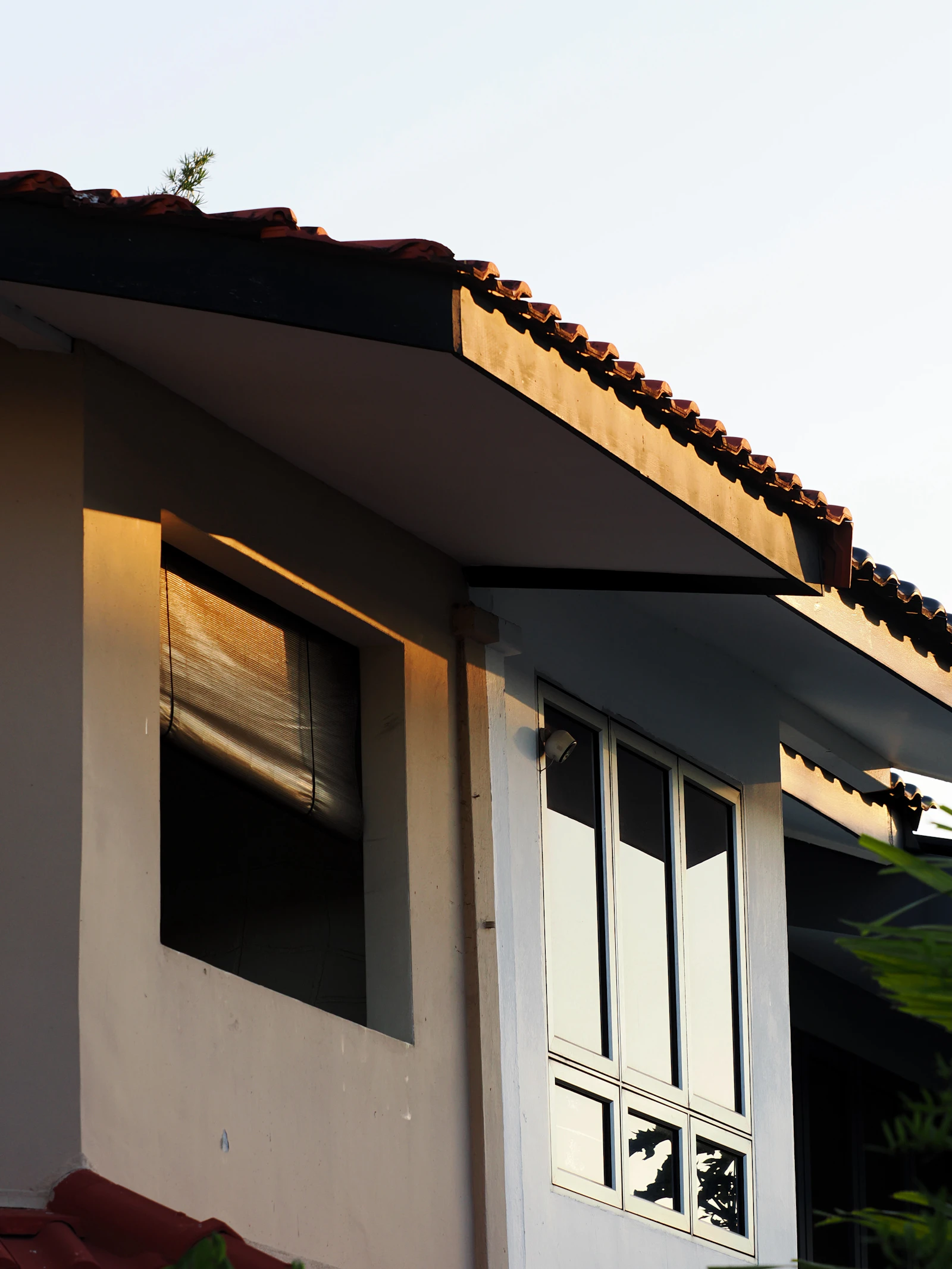 Close-up view of a residential roof and exterior