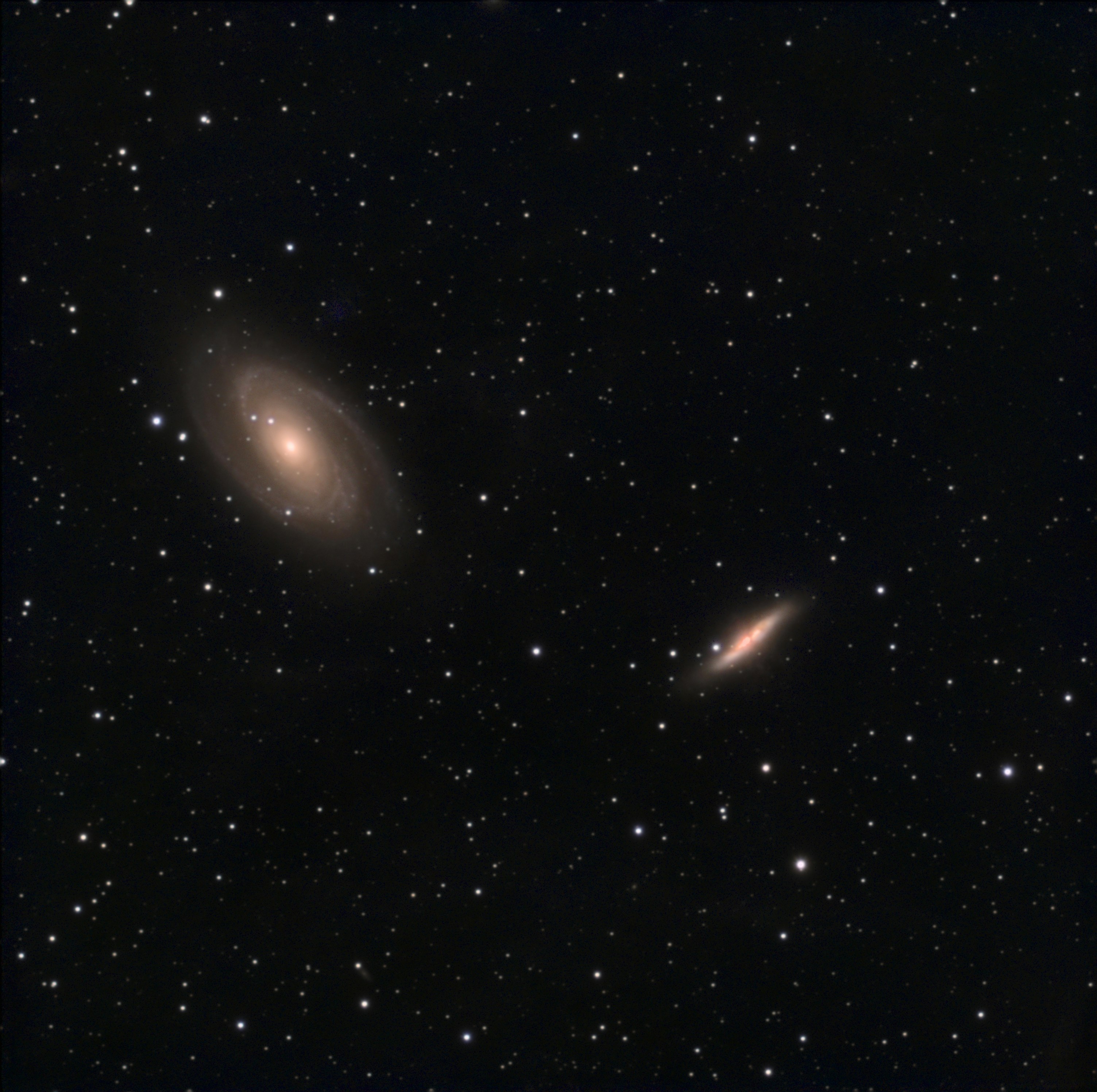 Dos galaxias en un cielo estrellado