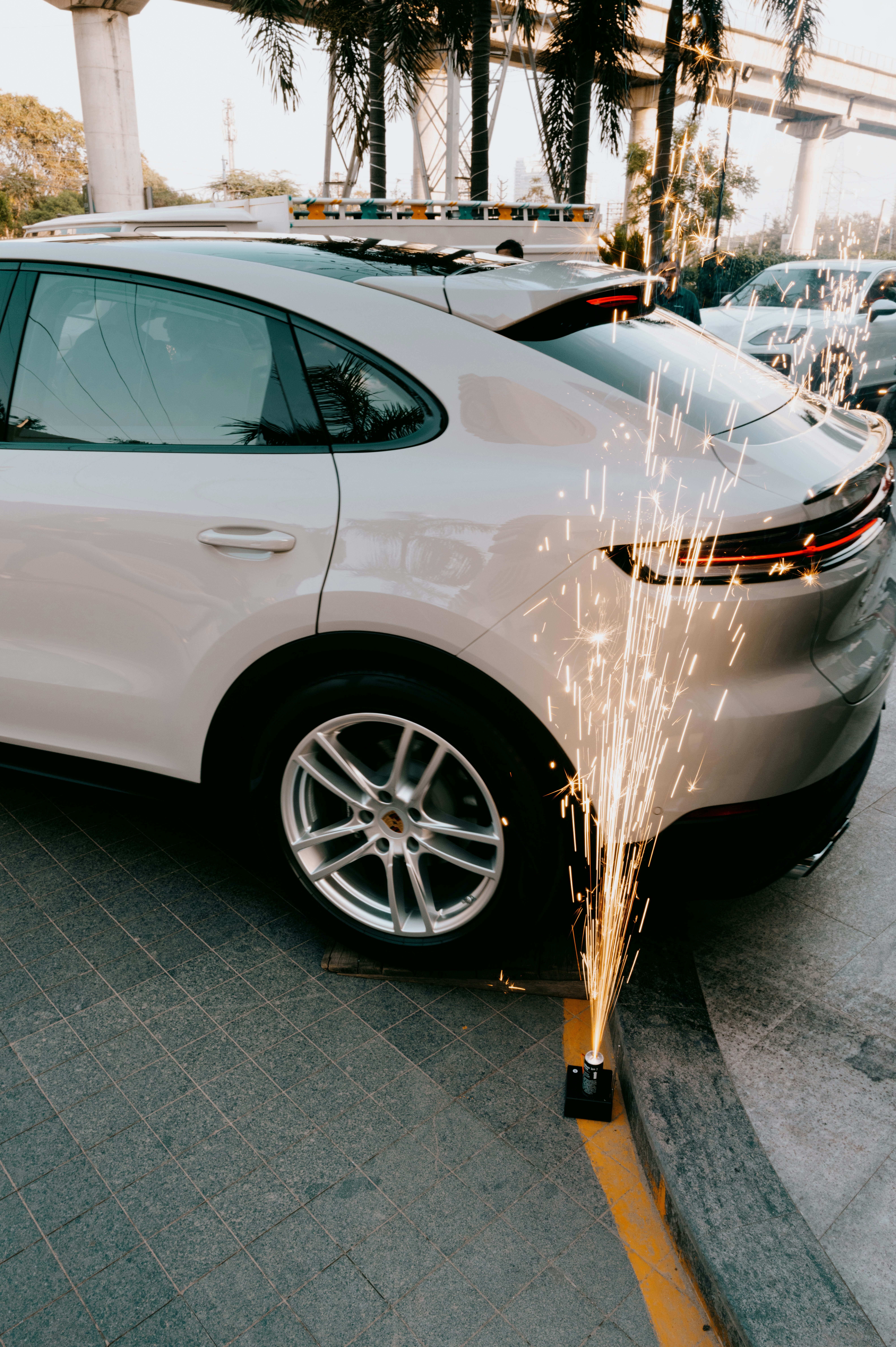 White car with fireworks on the side