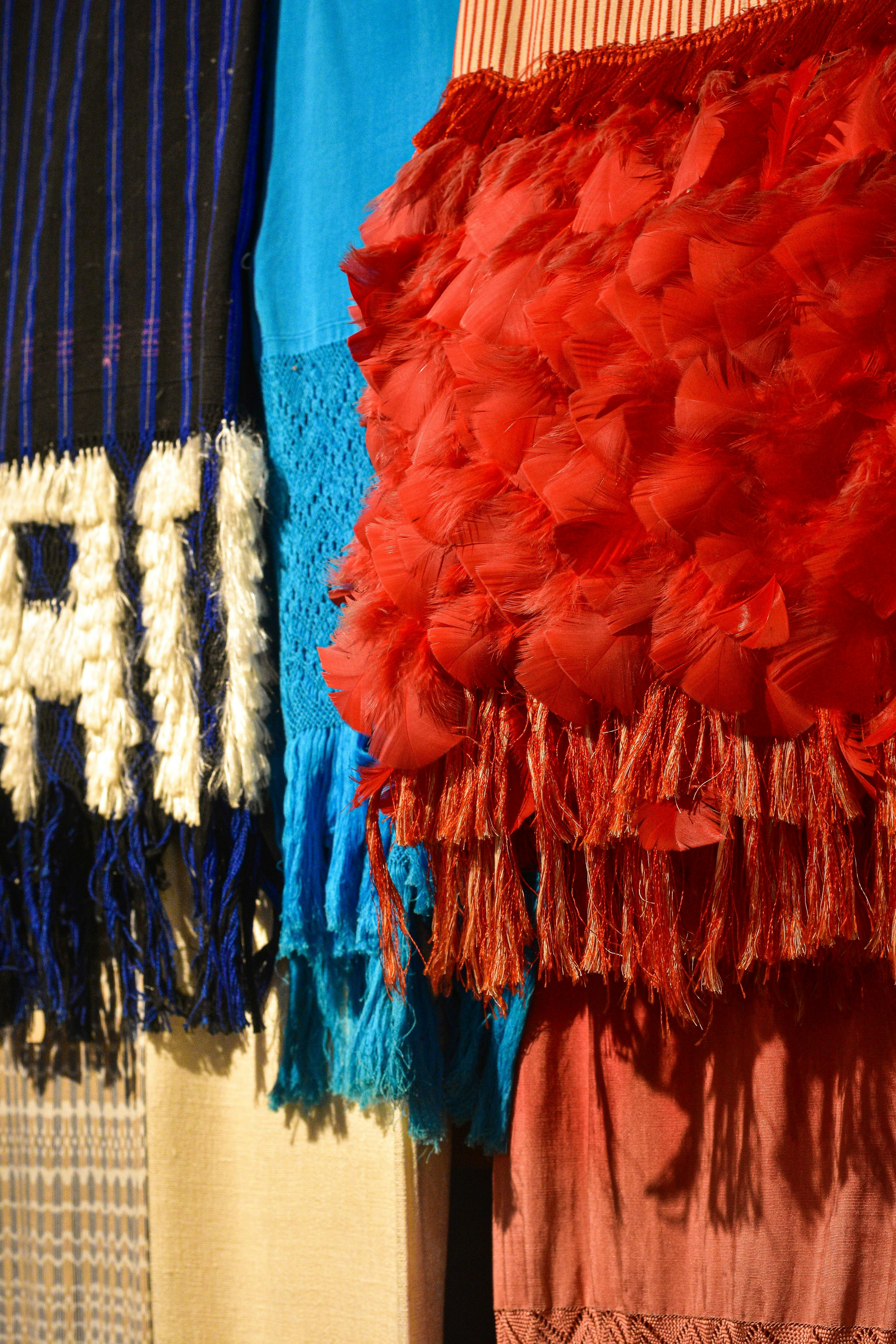 Colorful textiles with fringe and tassels