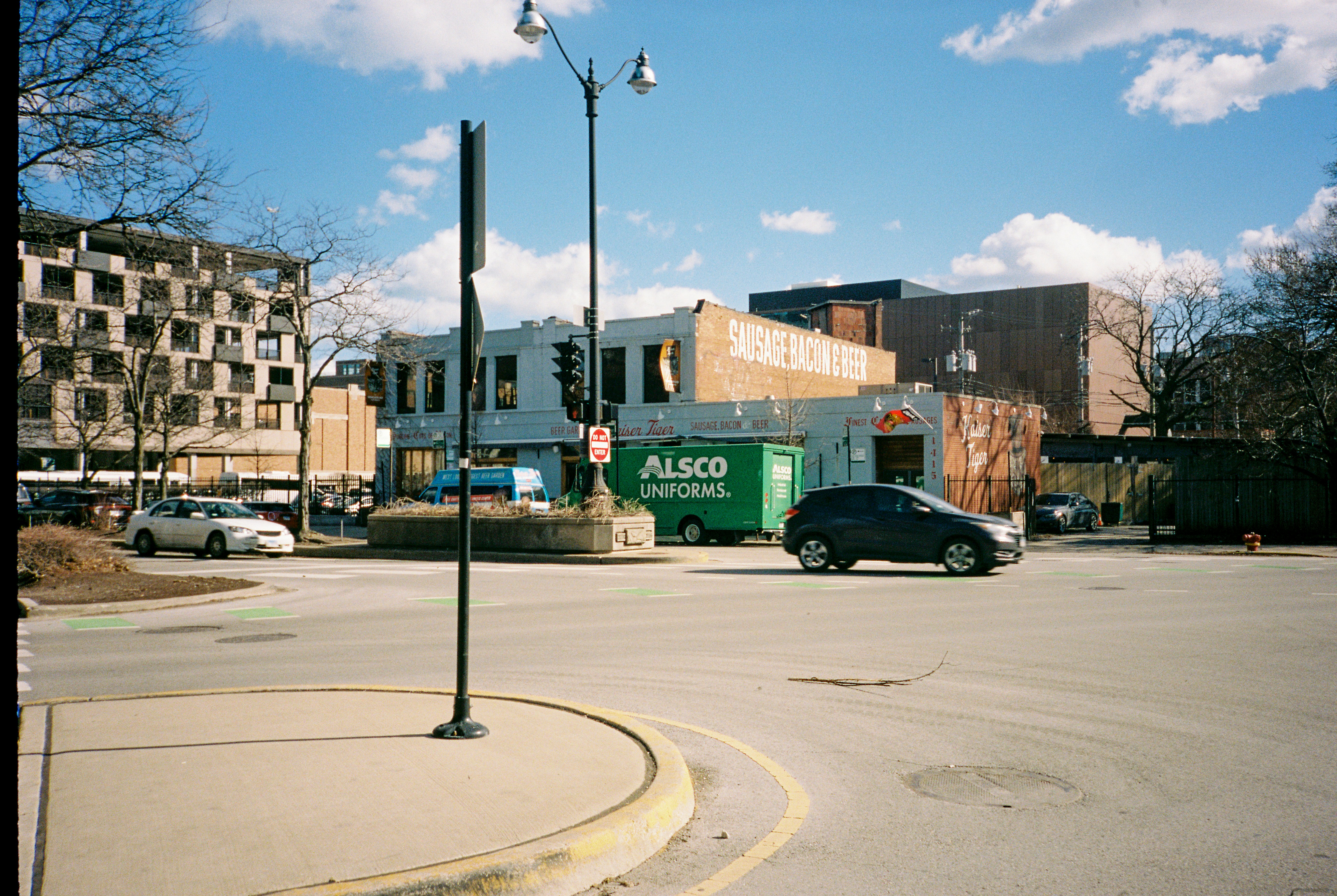 Cars and buildings on a sunny day