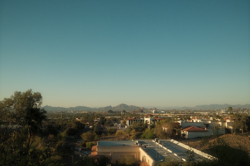 HVAC technician servicing an air conditioning unit in Levine, AZ