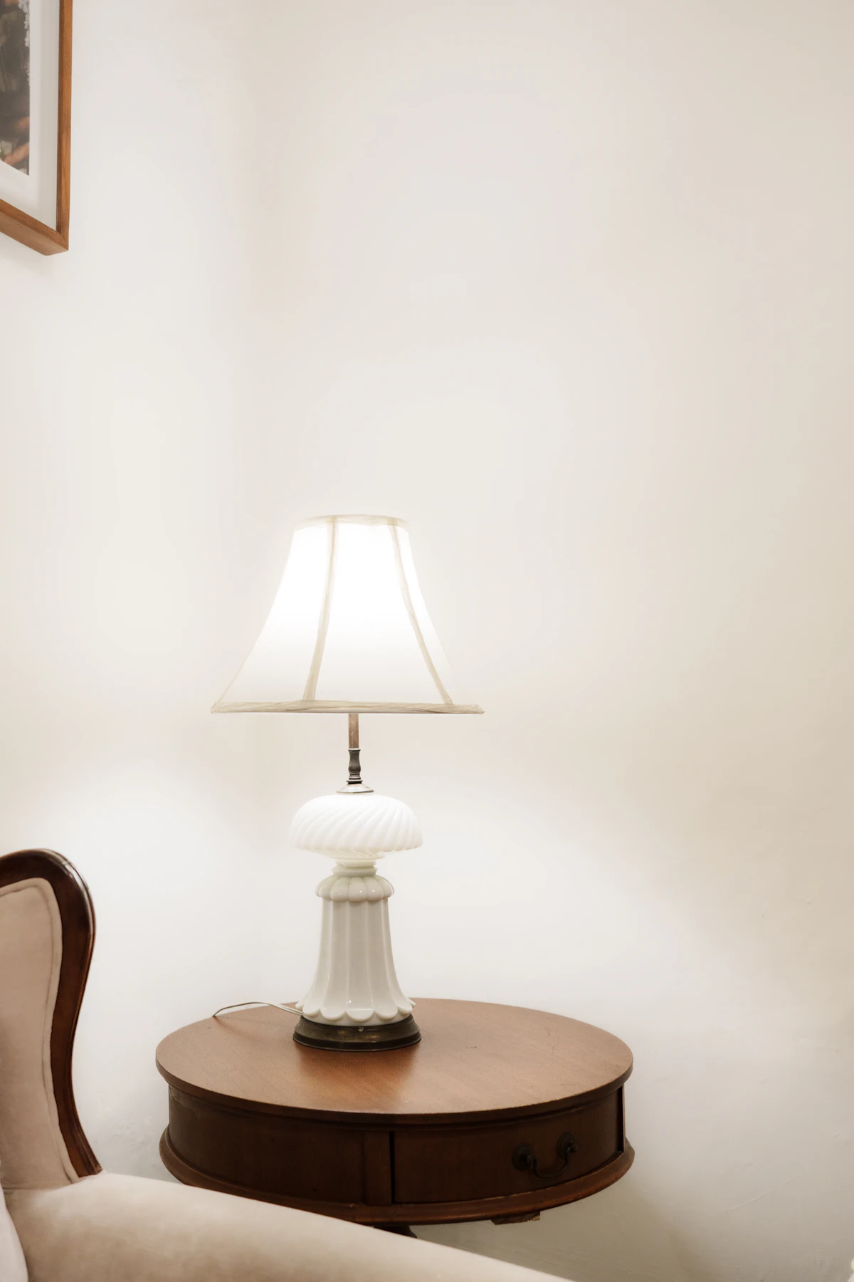 Portable warm lamp lighting a small rented lounge