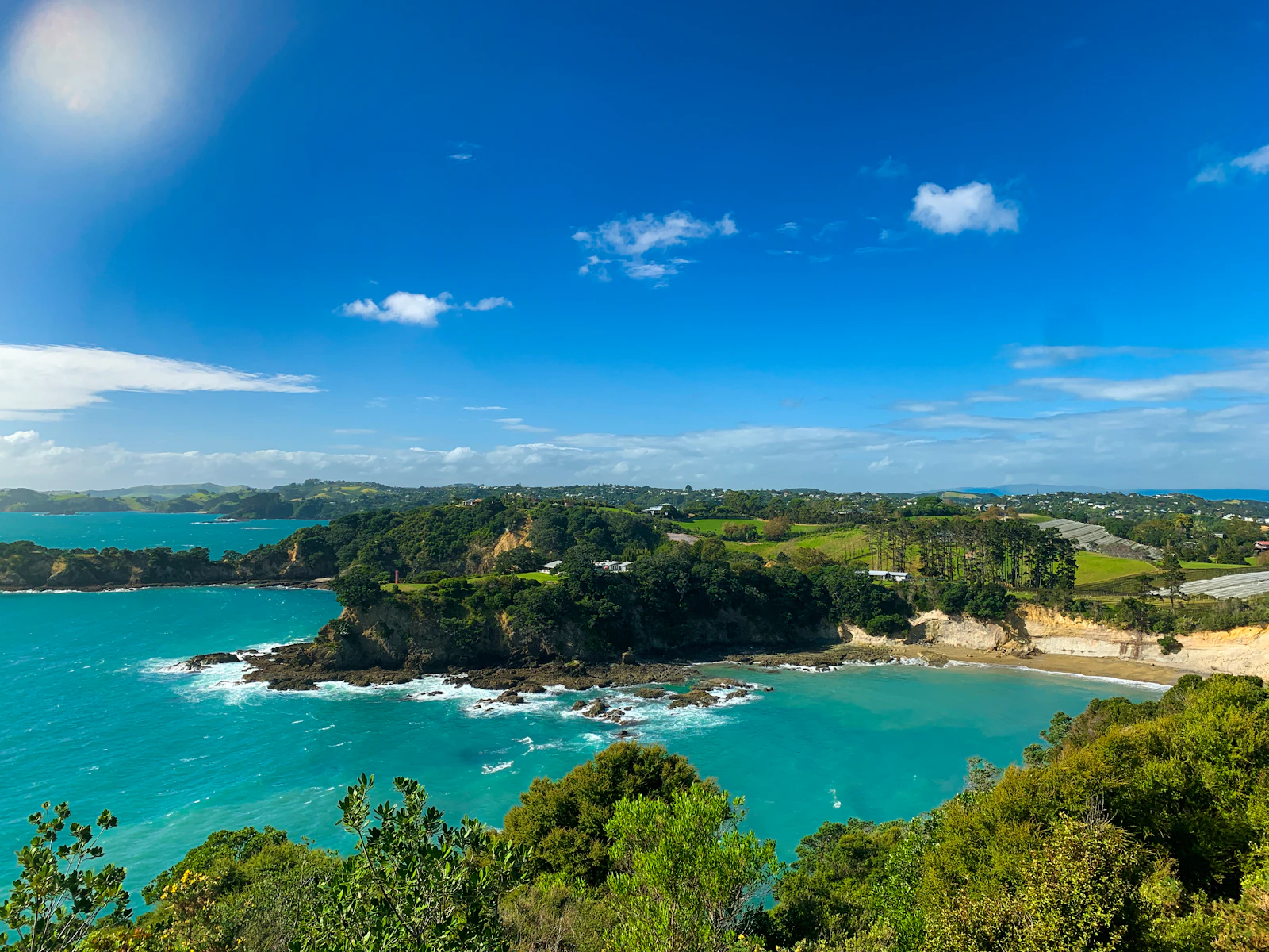 Waiheke Island — turquoise bay and green coastline in the Hauraki Gulf