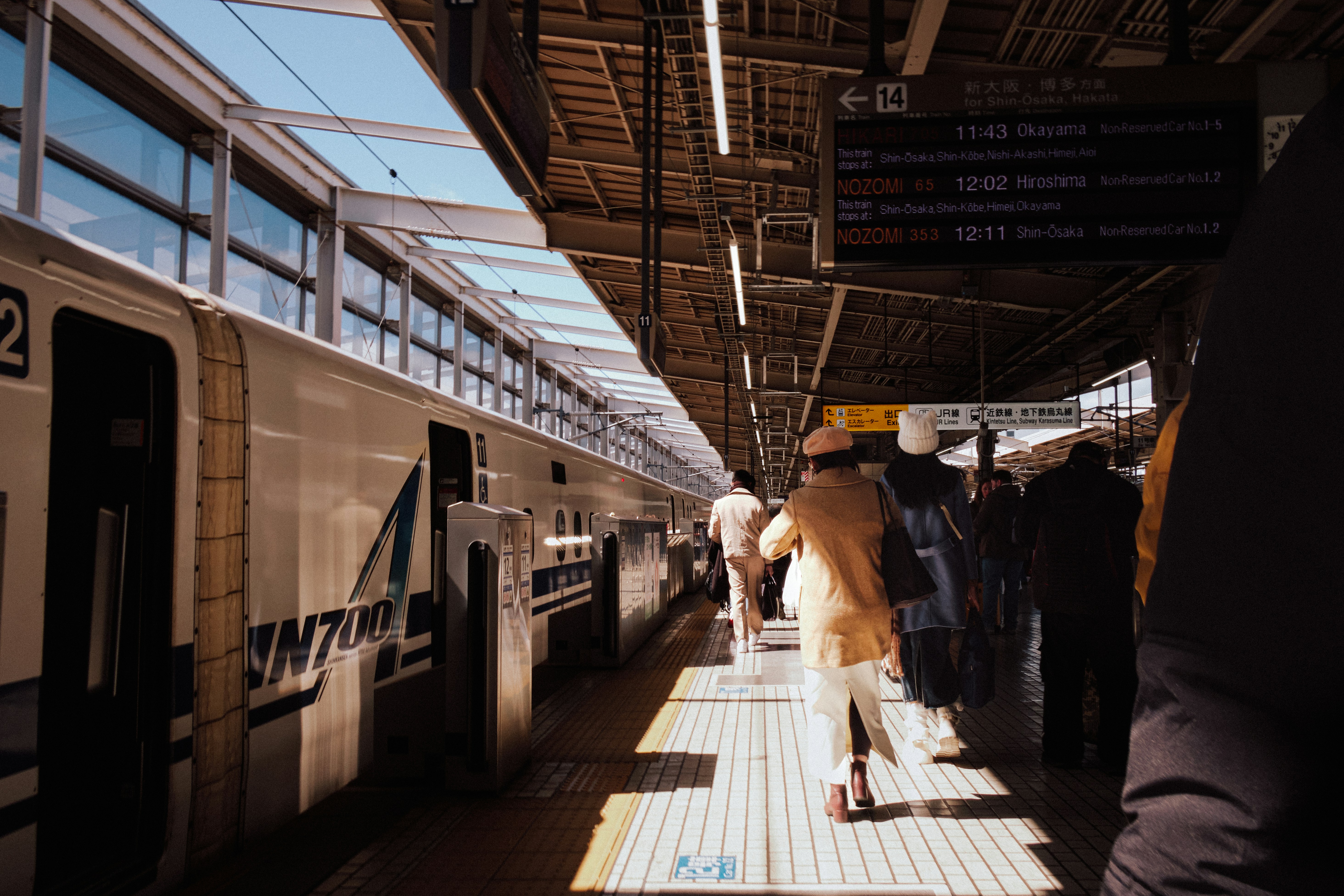 japan shinkansen station travelers