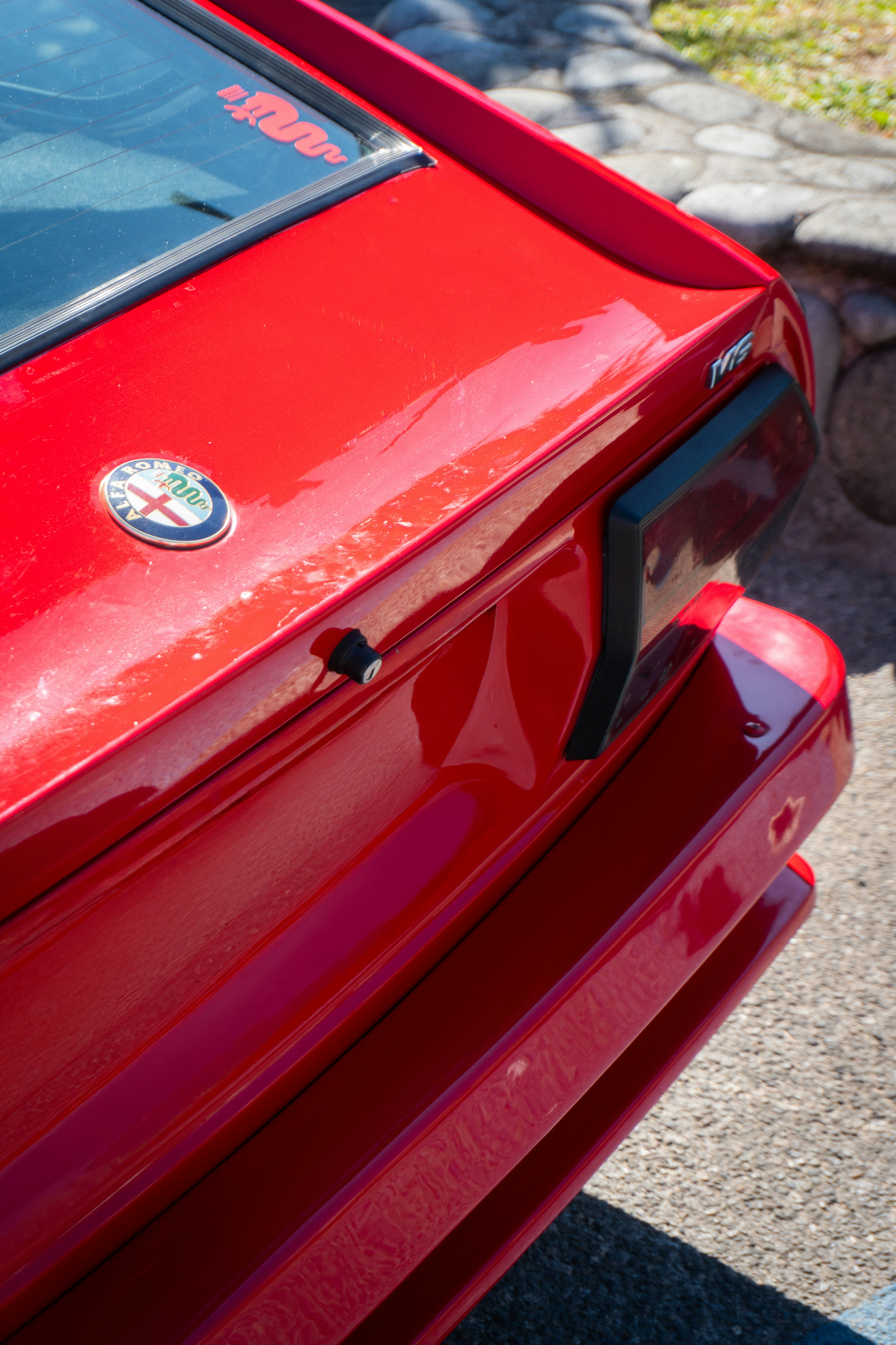 Close-up of a red vintage car's rear