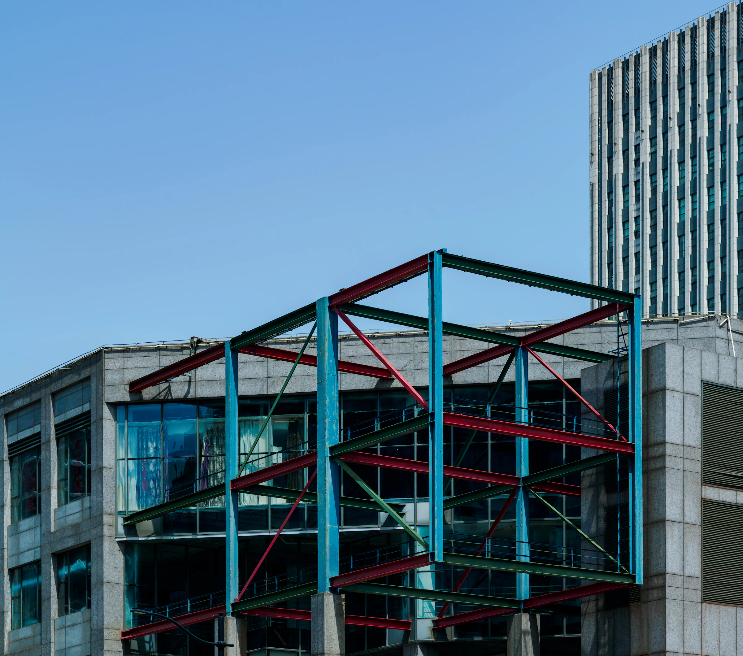 Modern building under construction with a steel frame