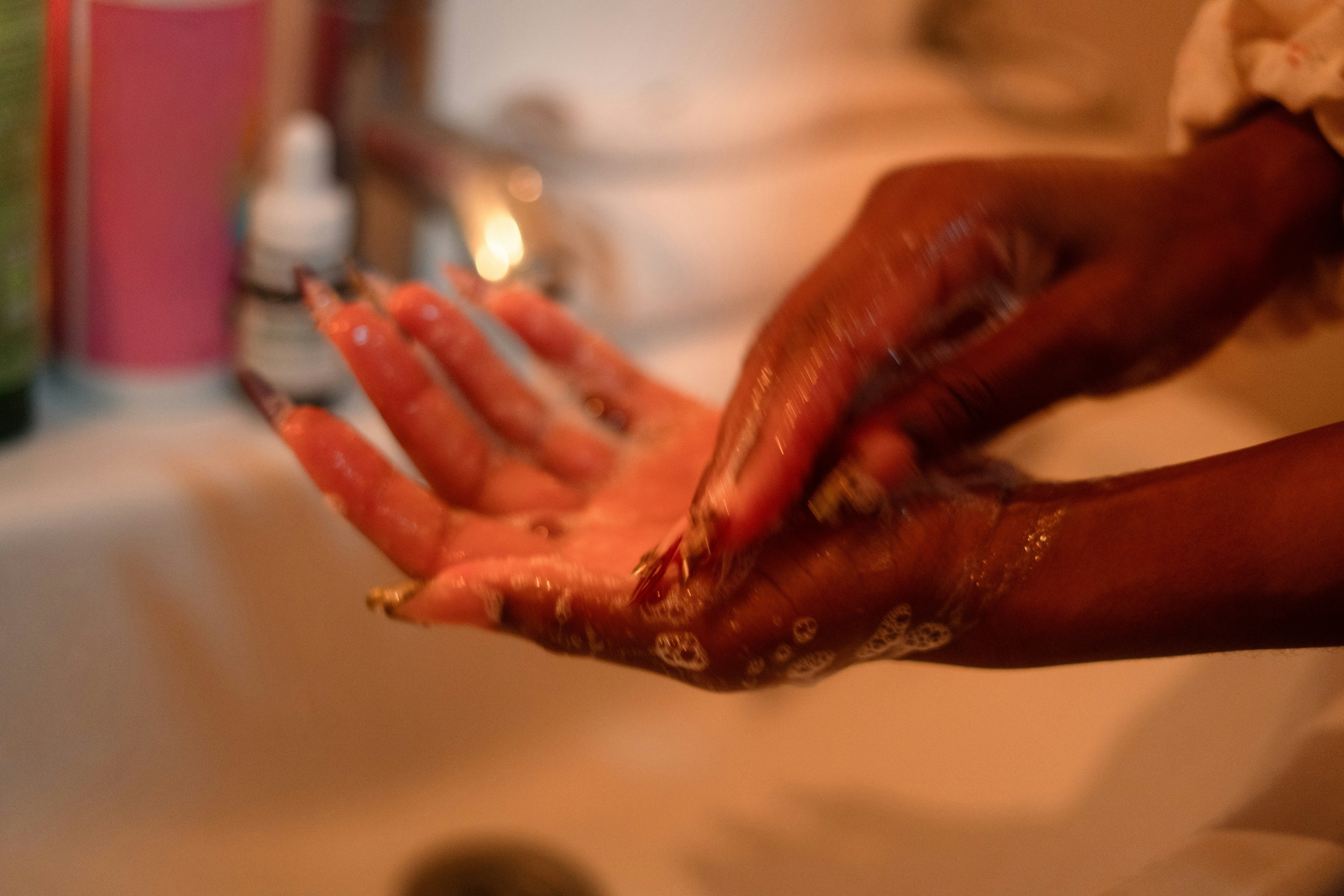 Washing hands gently with soap - finger tattoo healing stages