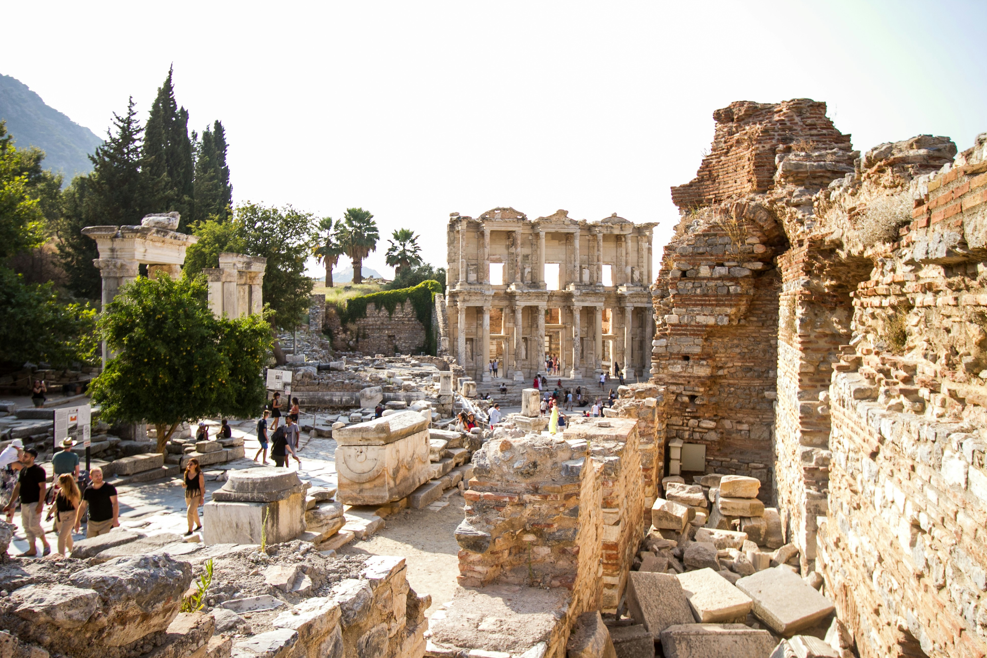 Ancient ruins with people exploring the historic site