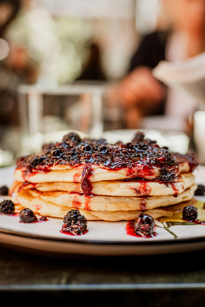 Pancakes topped with blackberry compote