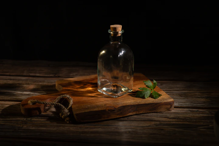 best essential oils for beginners laid out on a wooden surface