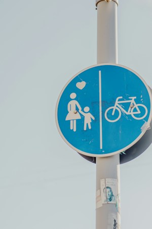 Pedestrian and bicycle path sign on a pole, similar to the wayfinding markers planned for each phase of the North Las Vegas beltway trail