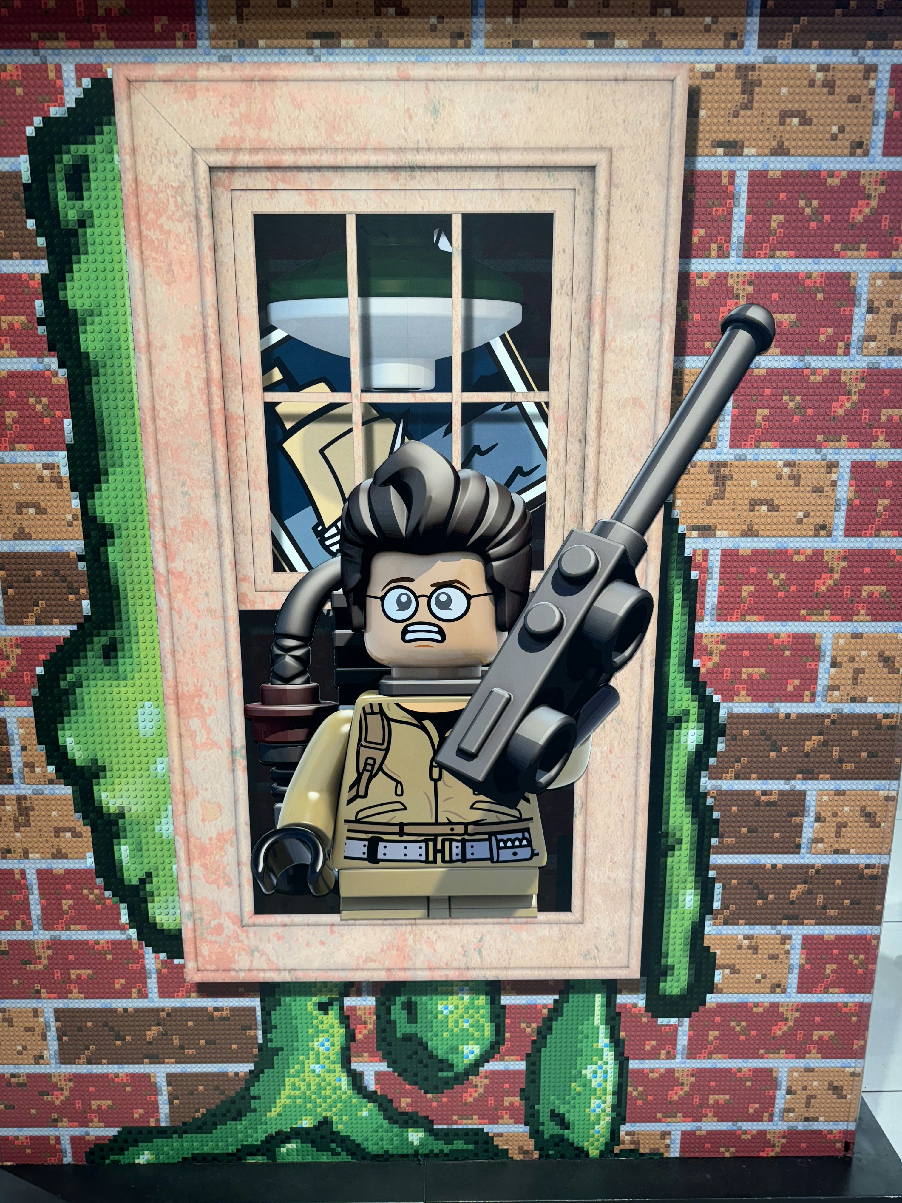 Lego ghostbusters character emerging from a window