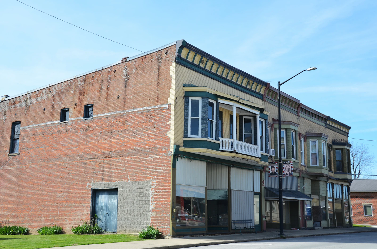 Converted brick commercial building with a low-slope roof of the kind found around Trinity Groves