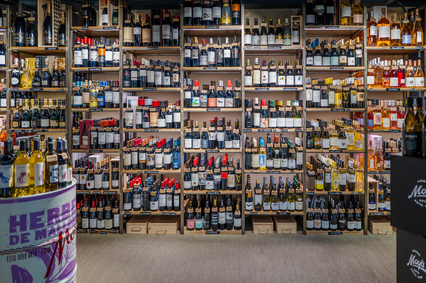 Shelves of bottled wine and spirits in a liquor store