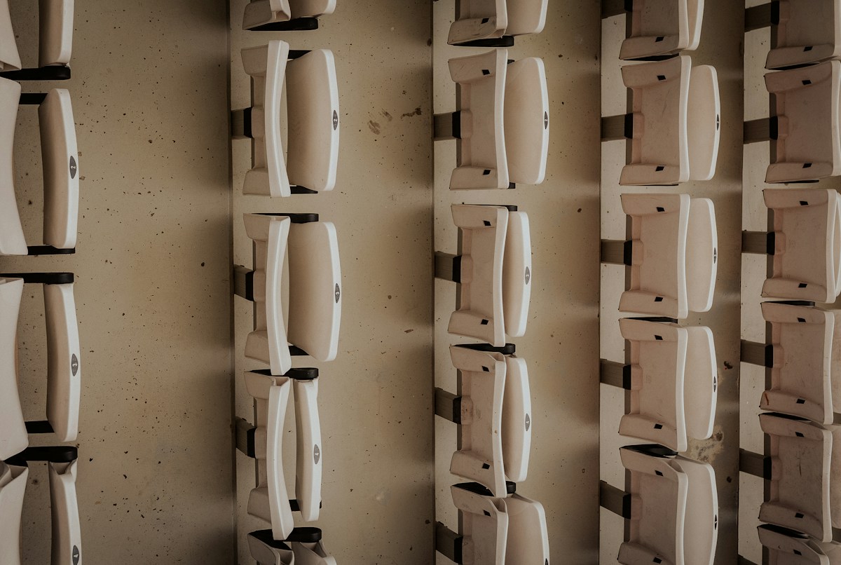 Rows of empty white seats in a stadium, ready for Christmas volunteers at the Salvation Army holiday volunteer program.
