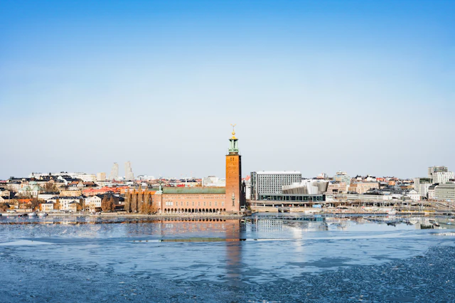 Stockholm skyline and brick City Hall across the water