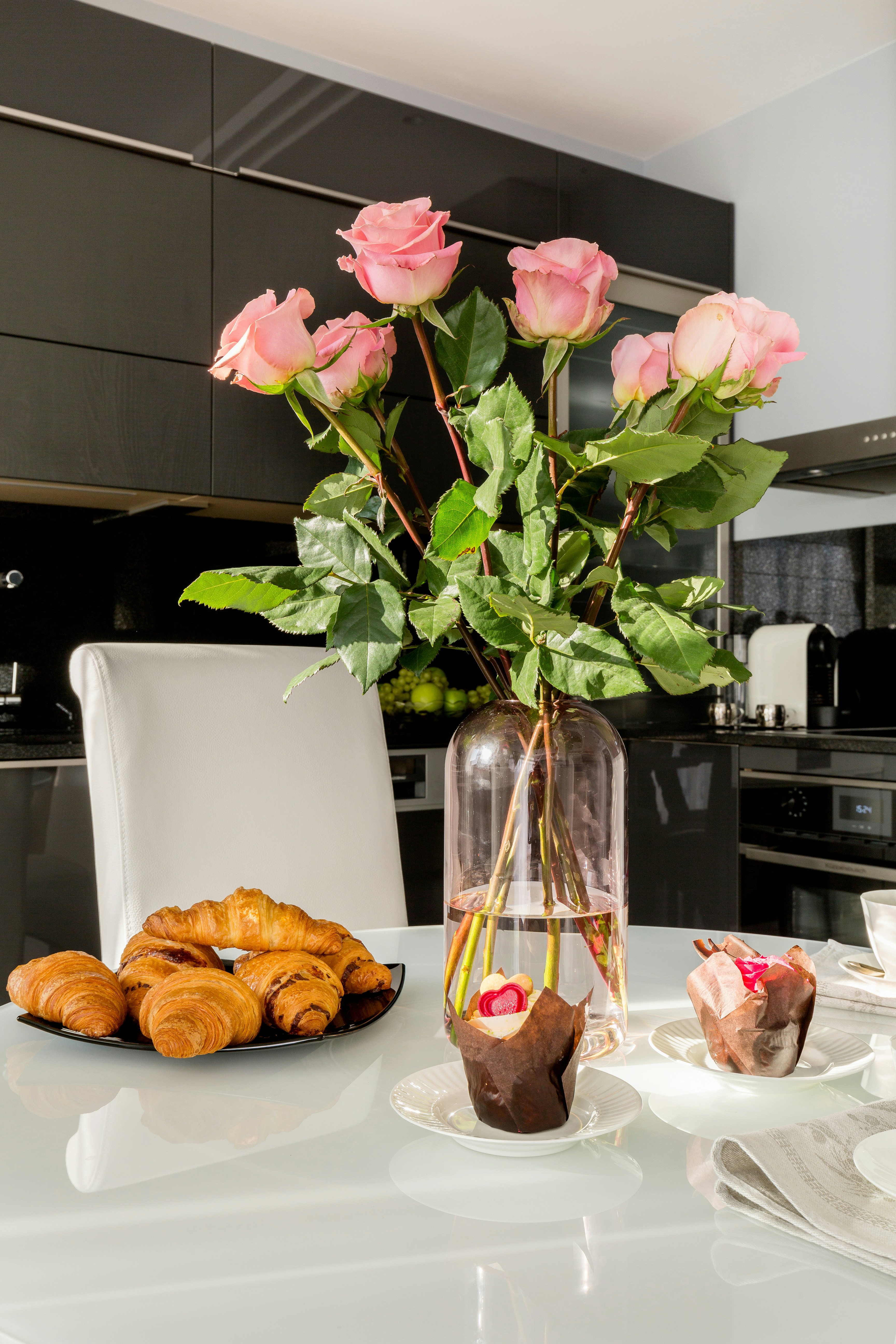 weekly flower delivery bouquet displayed in a bright kitchen